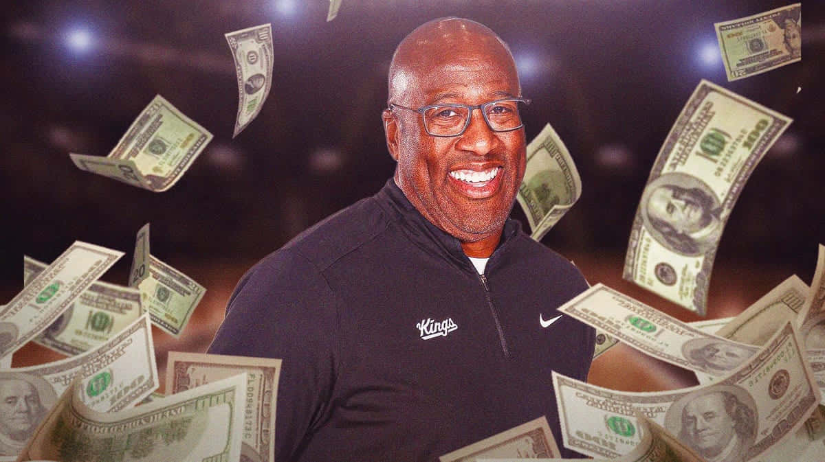 Mike Brown Smiling With Flying Money Background