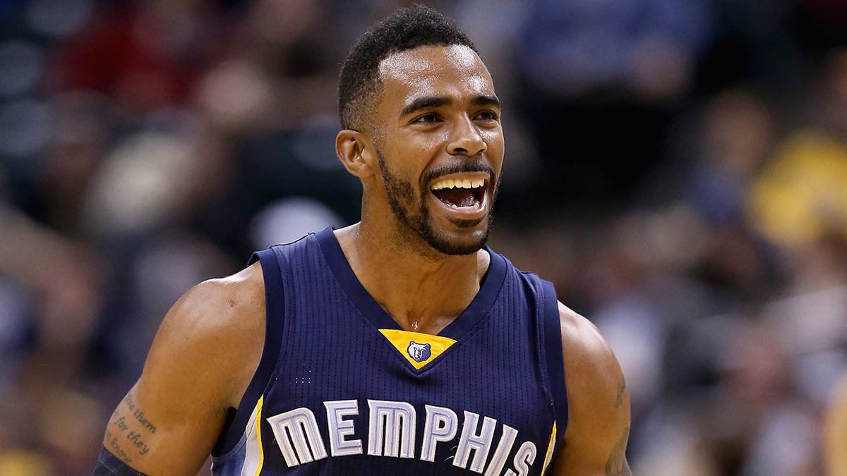 Mike Conley In Action For The Grizzlies Background