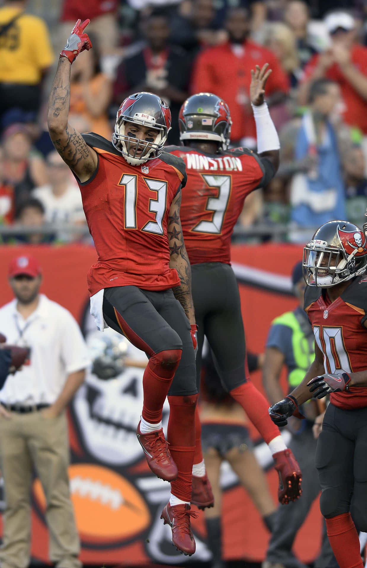 Mike Evans Showing His Championship Mentality On The Football Field Background