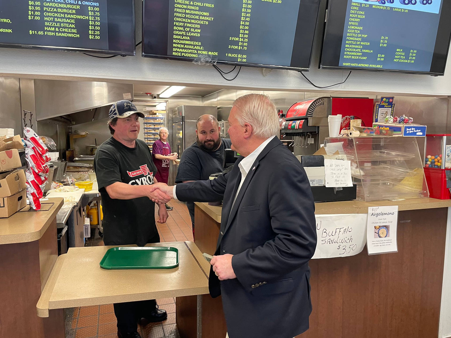 Mike Gibbons Shaking Hands With Employee