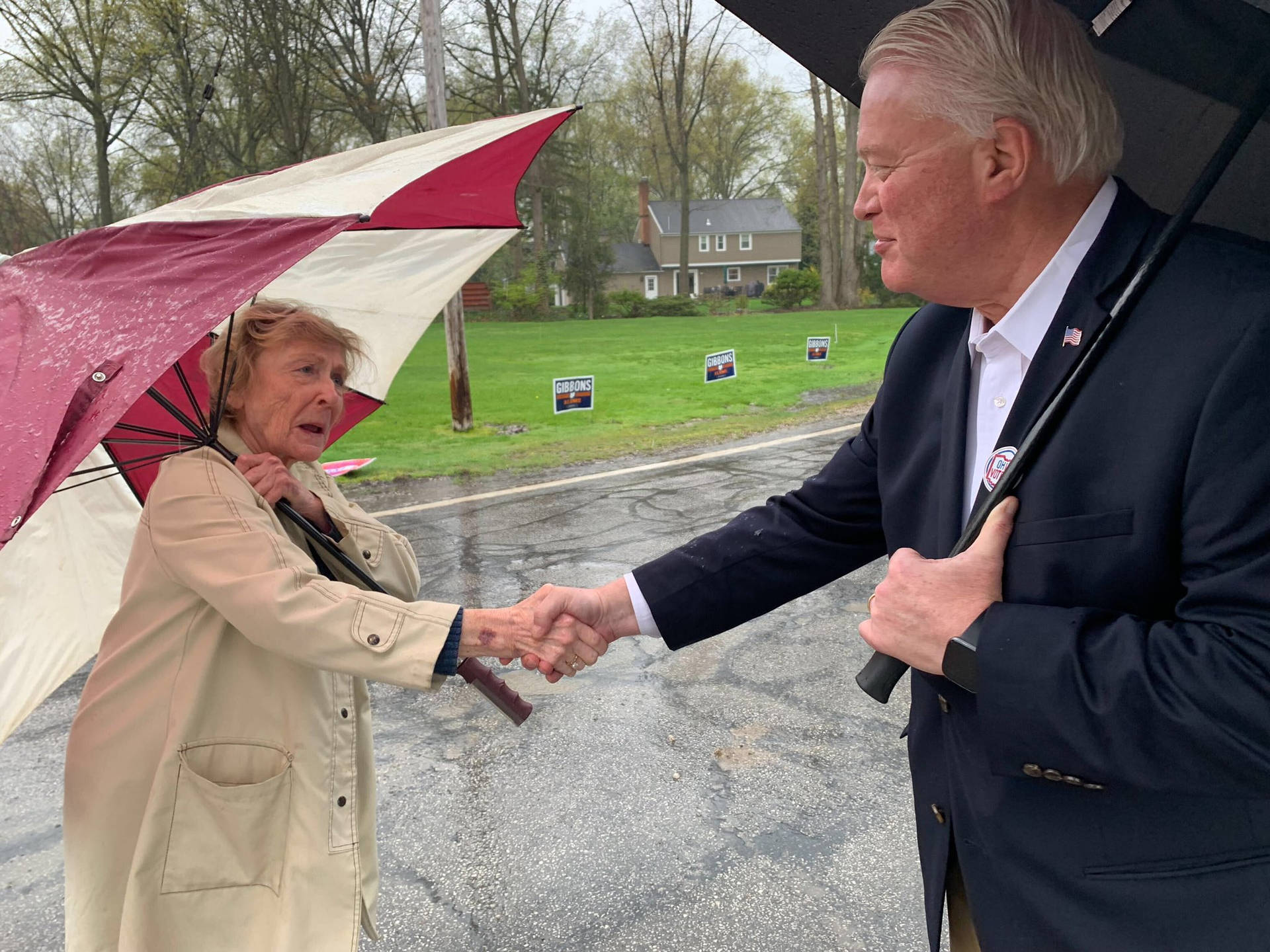 Mike Gibbons Shaking Hands With Woman