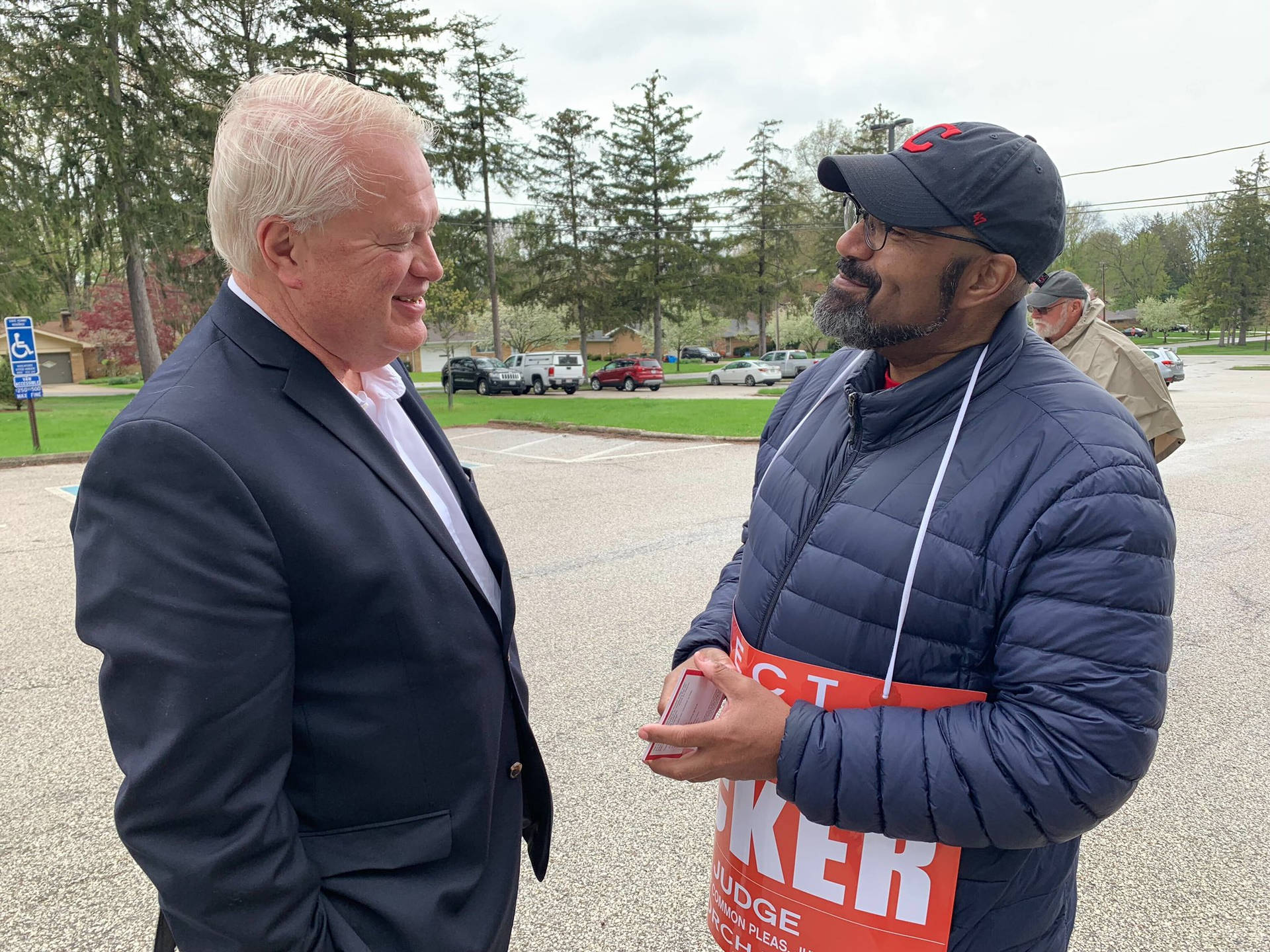 Mike Gibbons Smiling With Volunteer