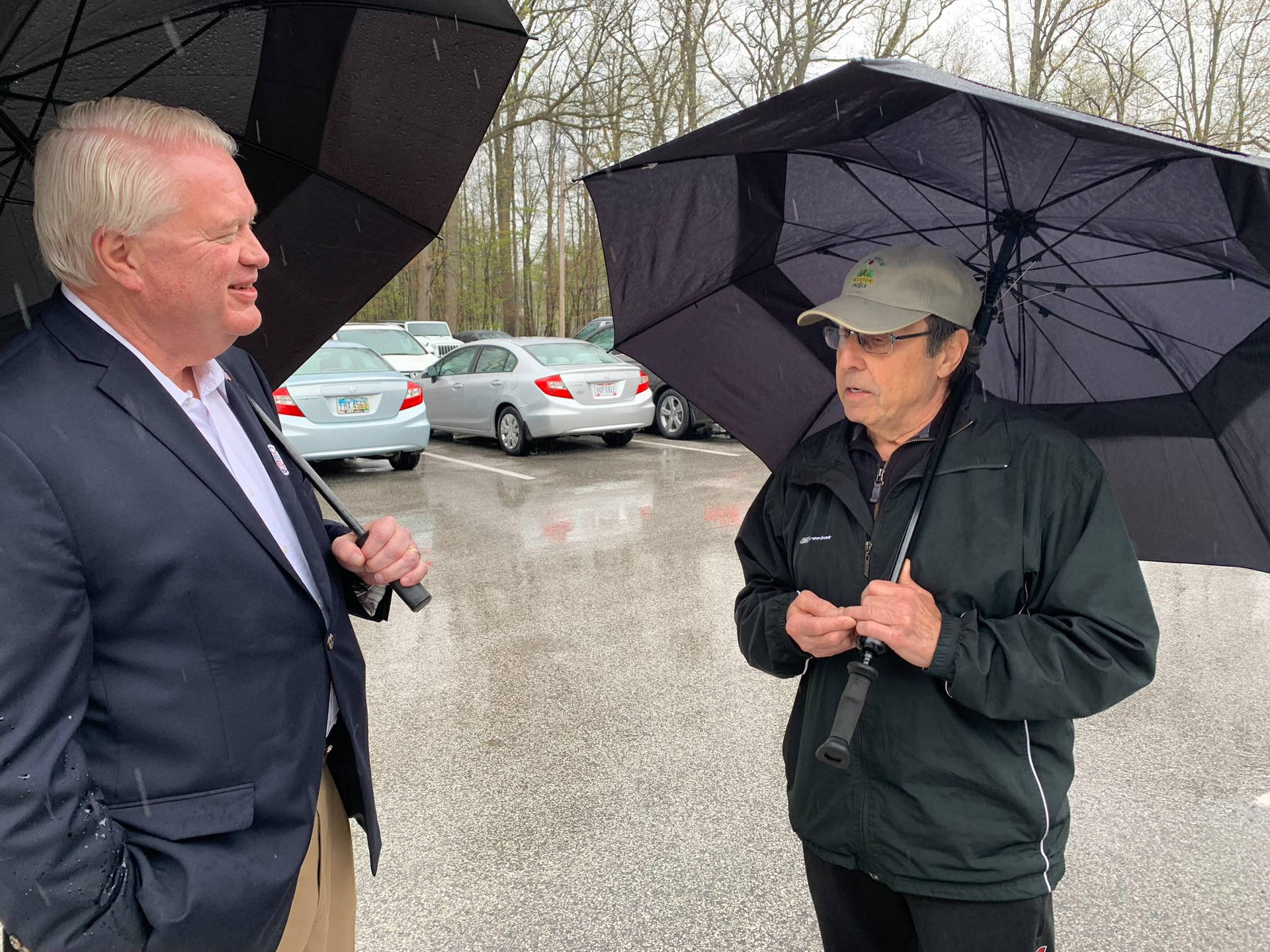 Mike Gibbons Talking To Local While Raining