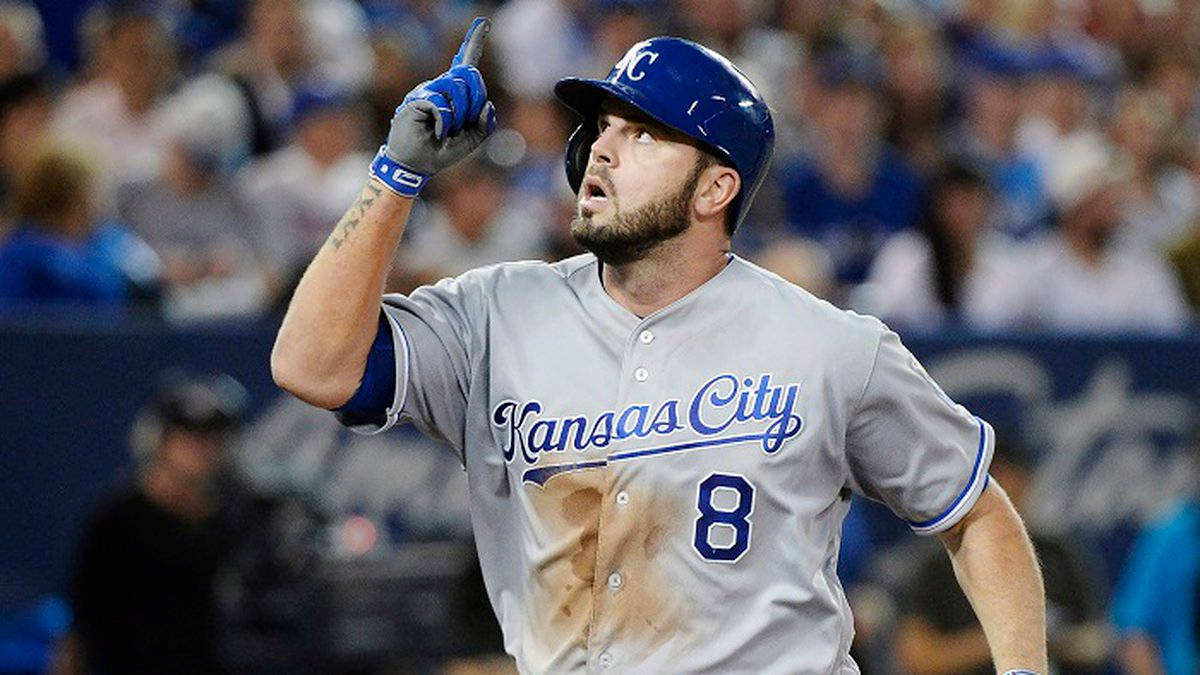 Mike Moustakas Pointing Up Background