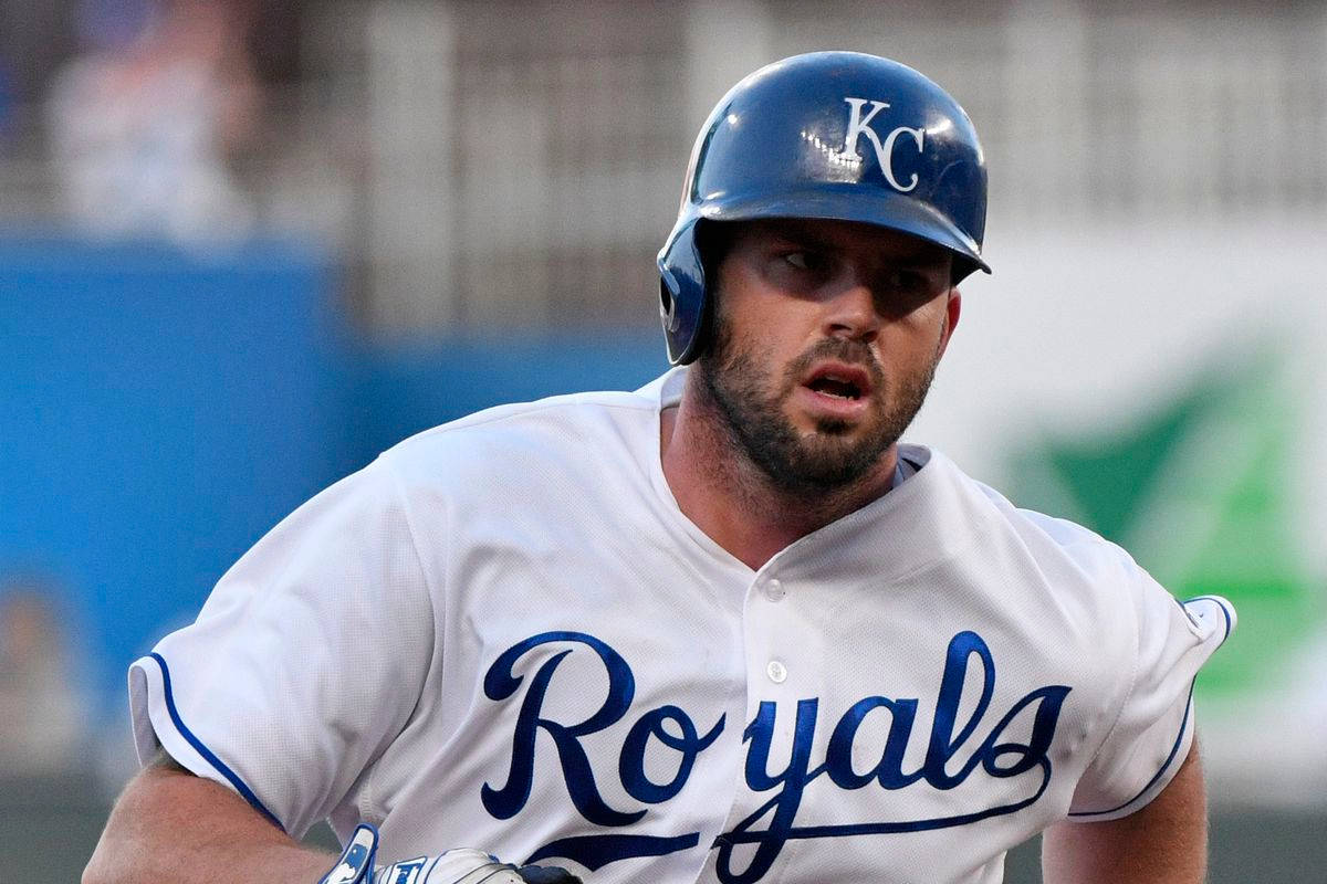 Mike Moustakas Running Closeup Background