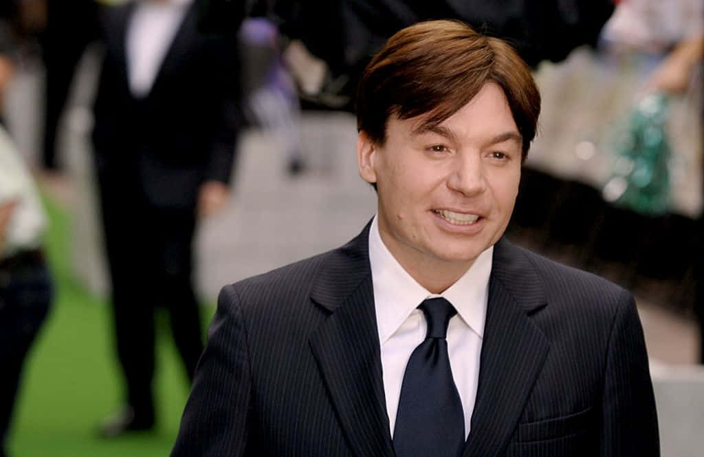 Mike Myers Doing What He Does Best Background