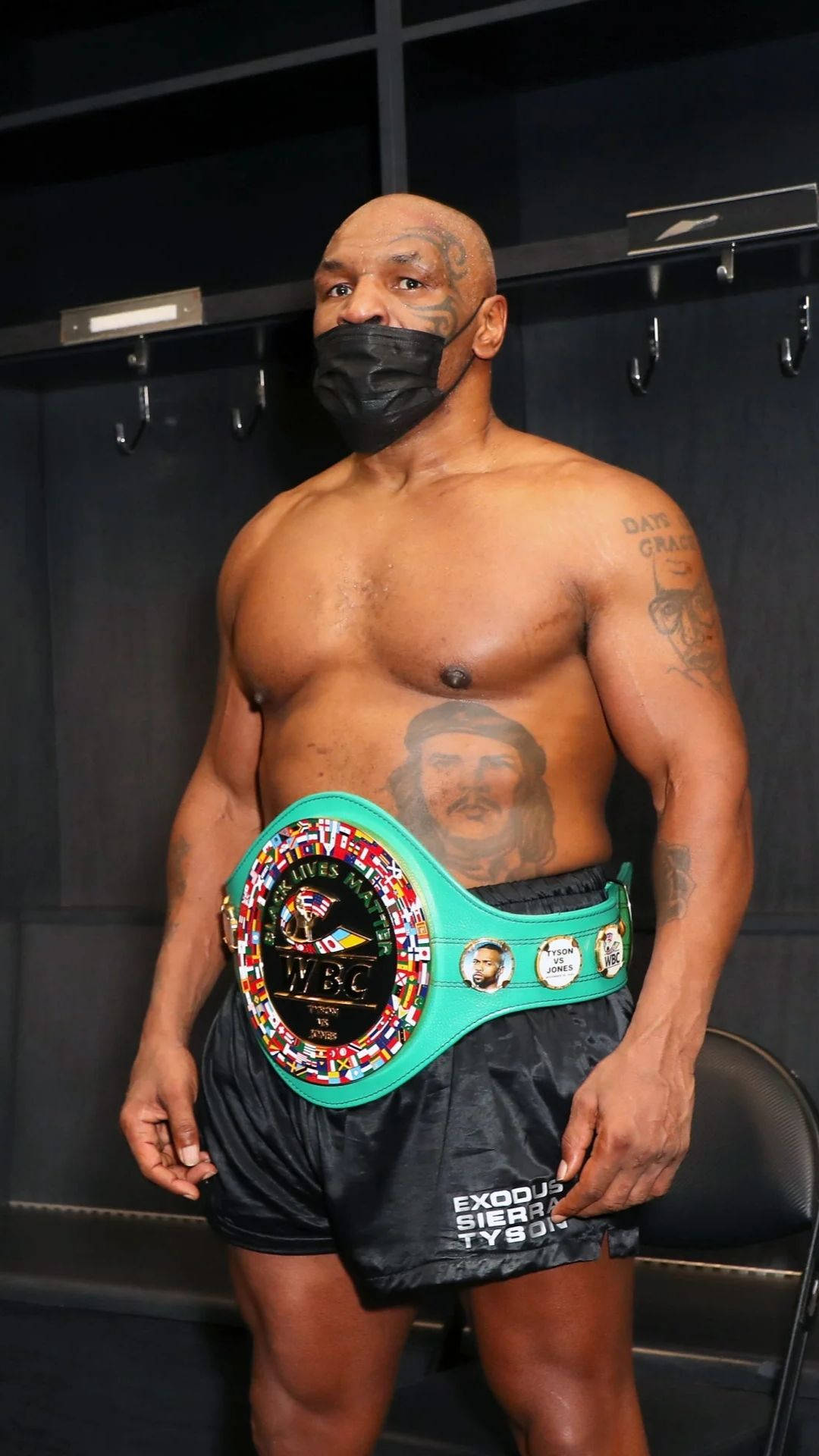 Mike Tyson Wearing A Mask Background