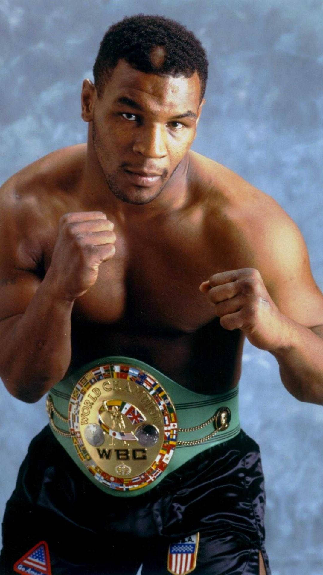 Mike Tyson With Championship Belt Background