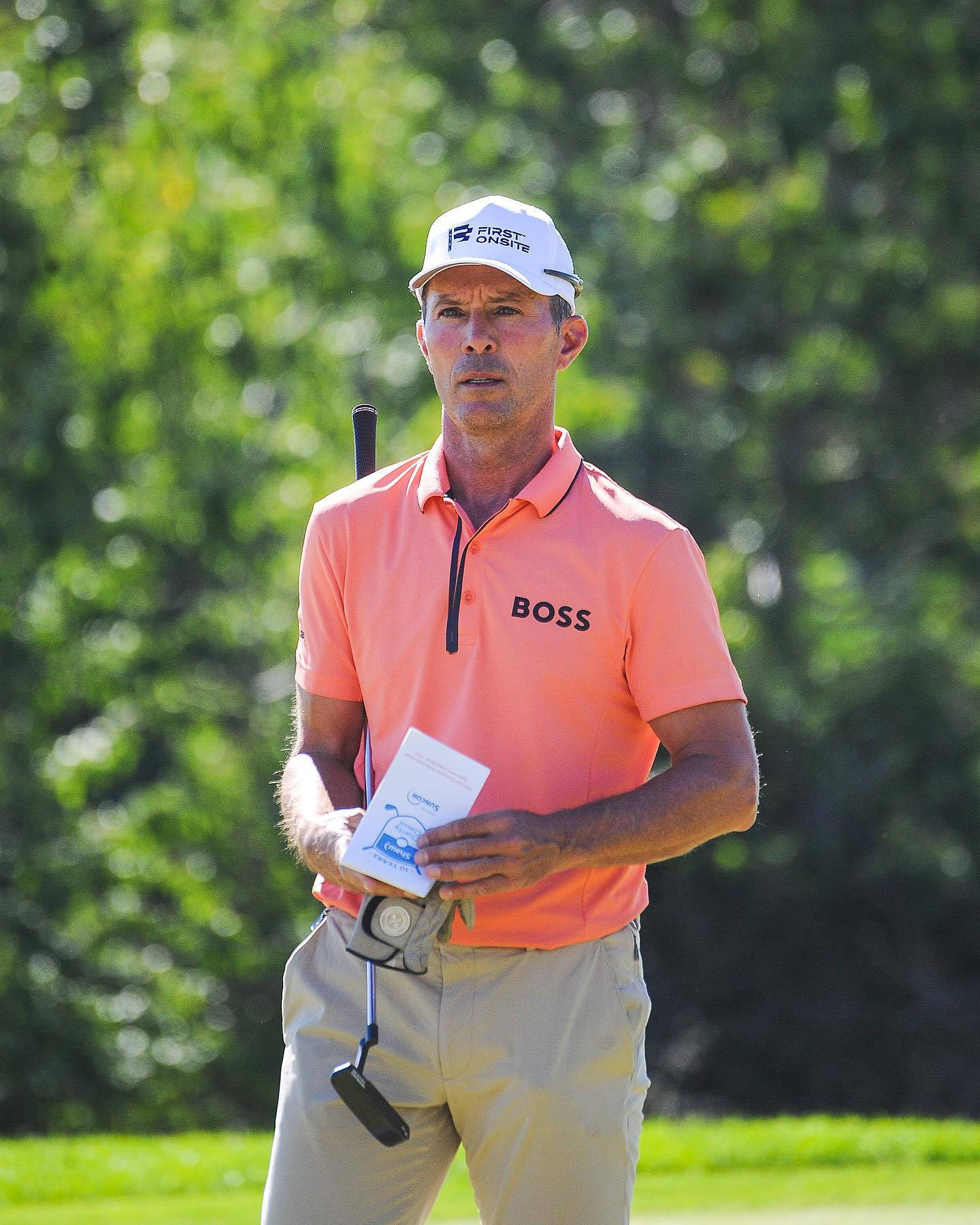 Mike Weir In Orange Shirt Background