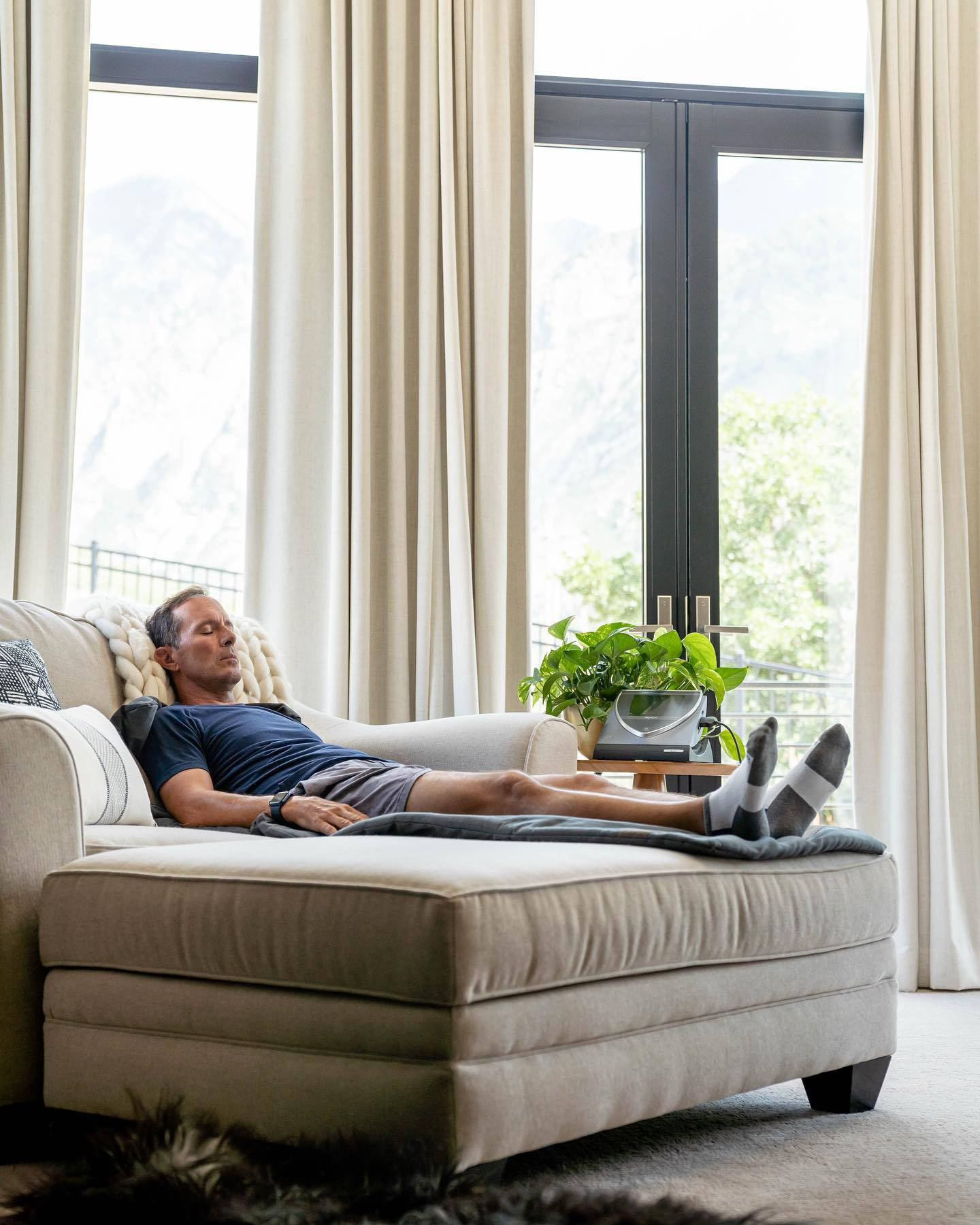 Mike Weir Relaxing On Couch Background