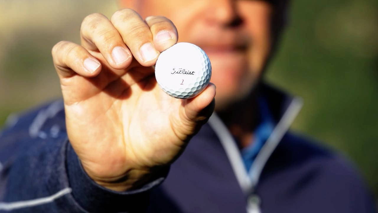 Mike Weir Showing Off Golf Ball Background