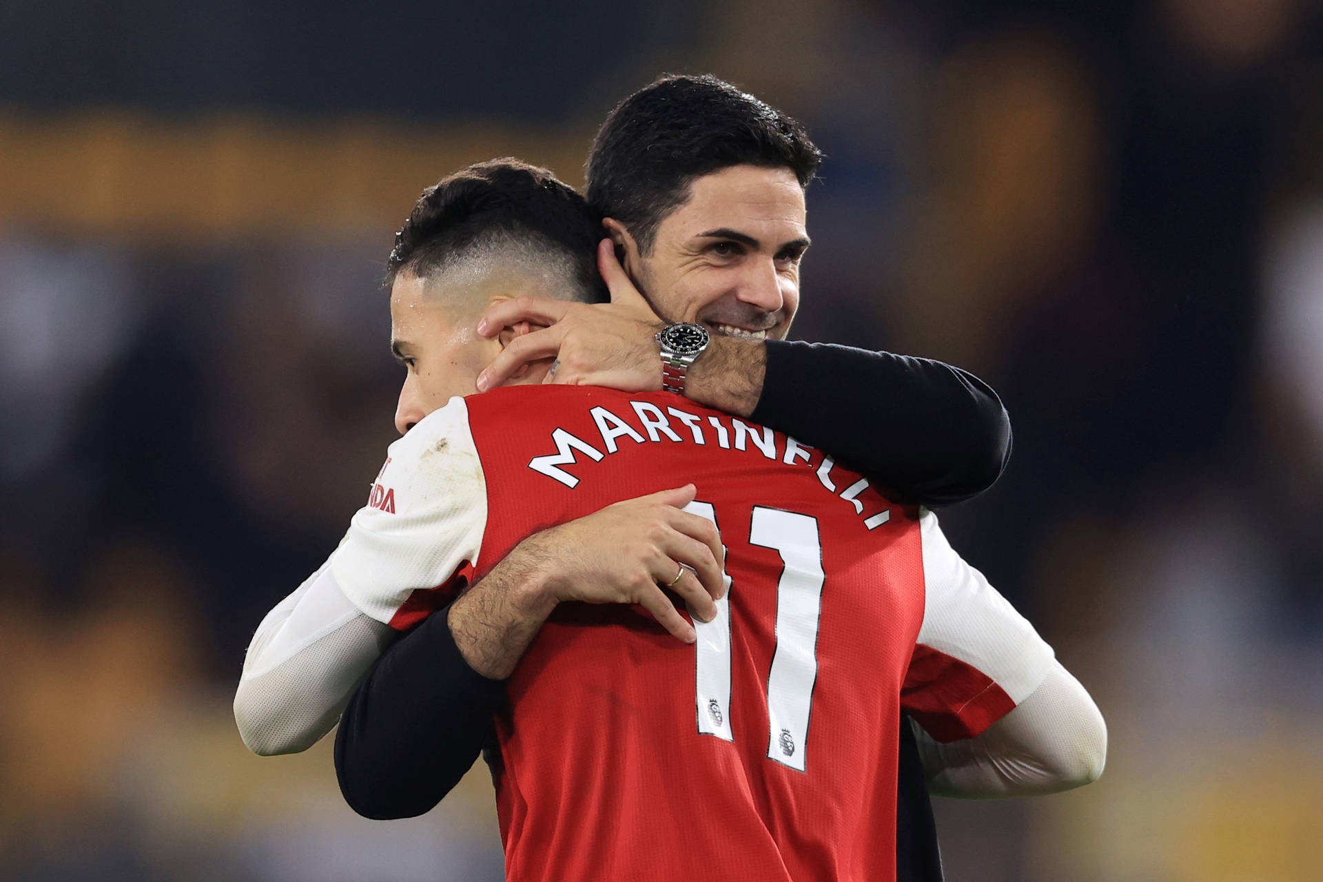 Mikel Arteta Hugging Gabriel Martinelli Background