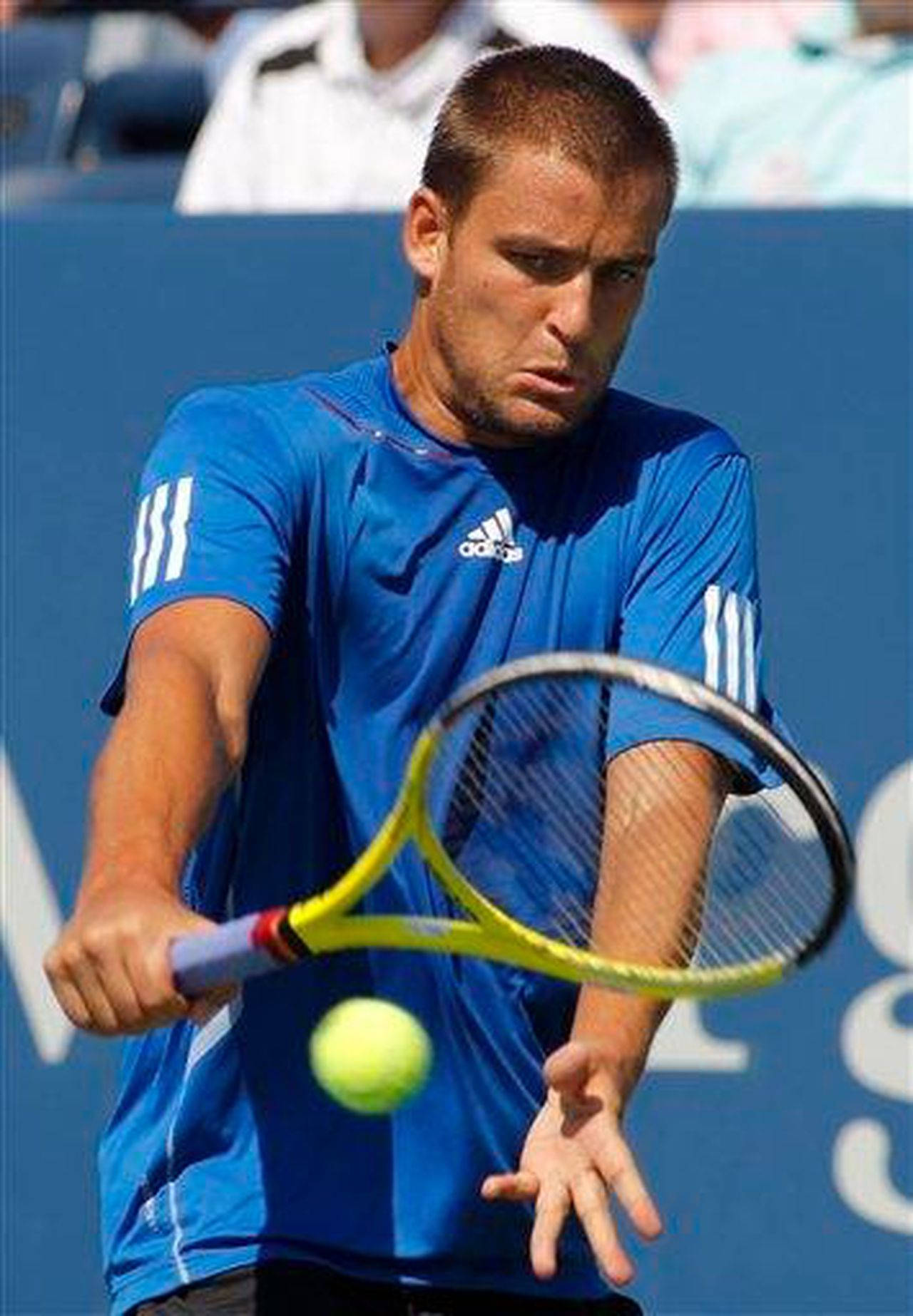 Mikhail Youzhny Ball Serve Background