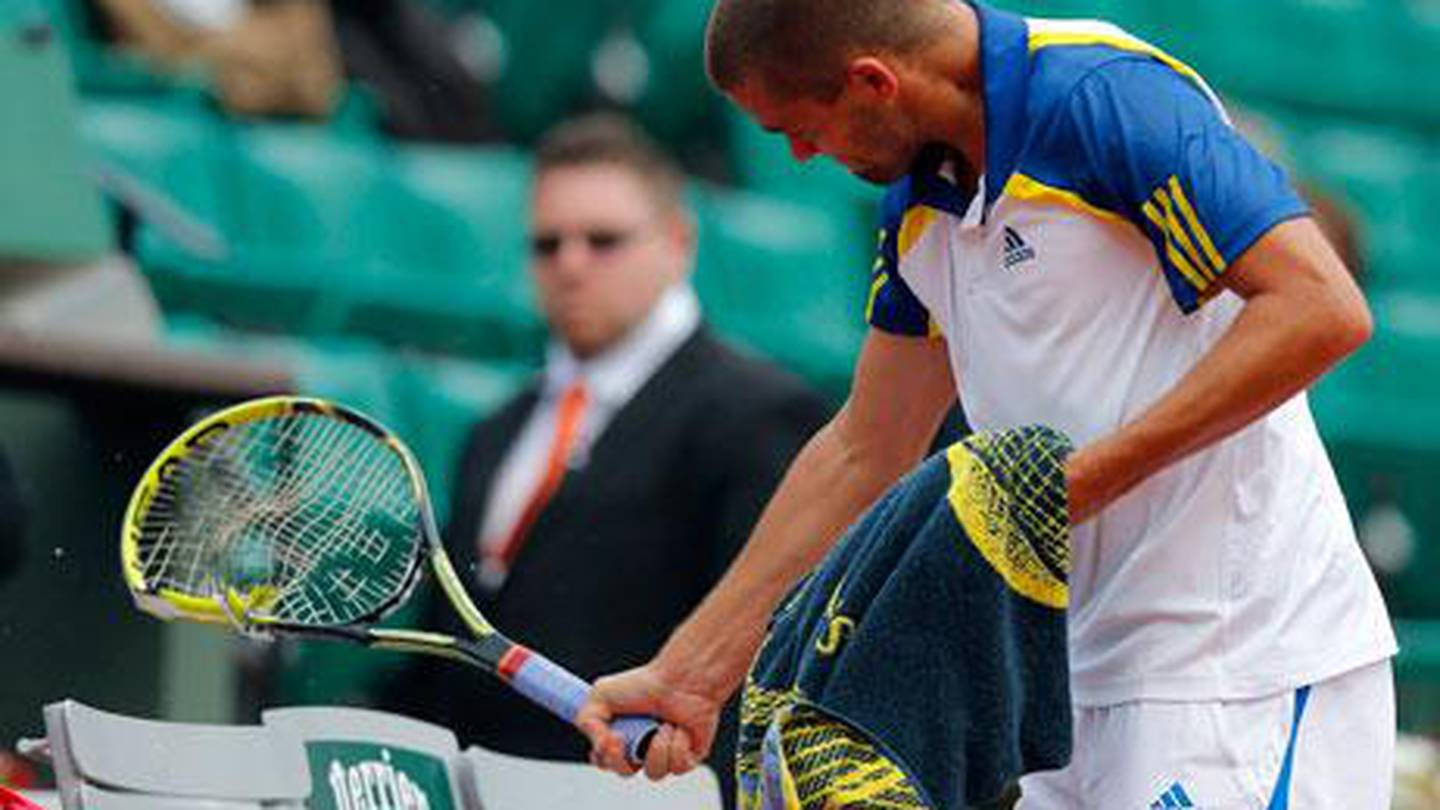 Mikhail Youzhny Holding Broken Racket