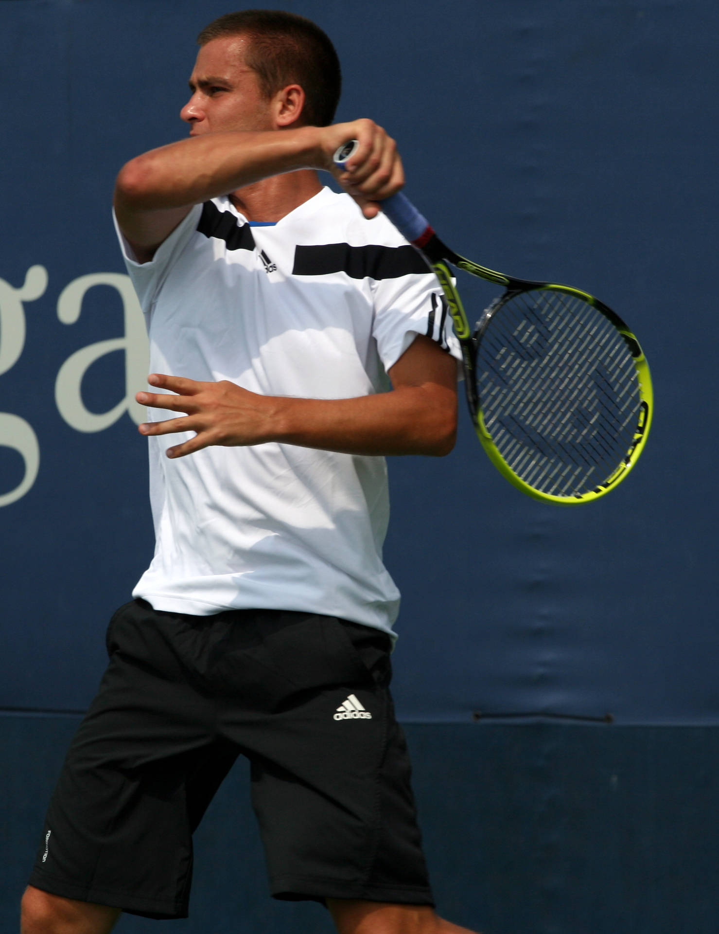 Mikhail Youzhny In Action, Showcasing Tennis Skills Background