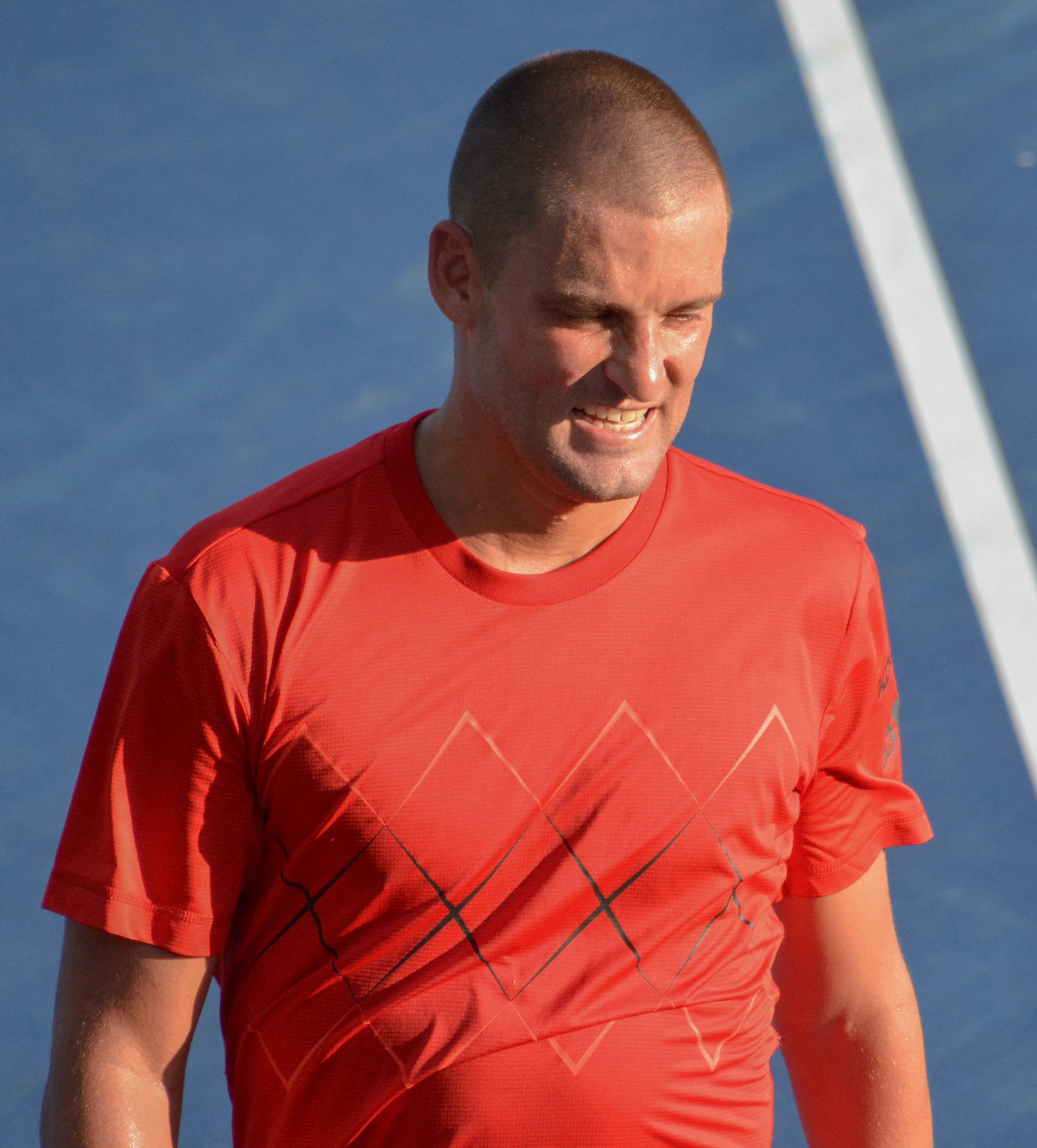 Mikhail Youzhny In Action - The Russian Tennis Maestro In Red