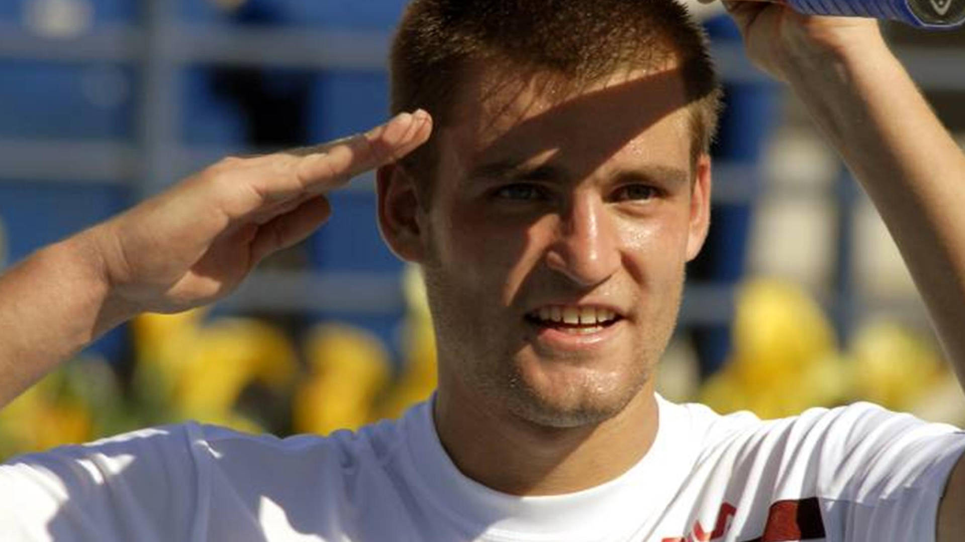 Mikhail Youzhny Performing His Signature Hand Salute On The Court