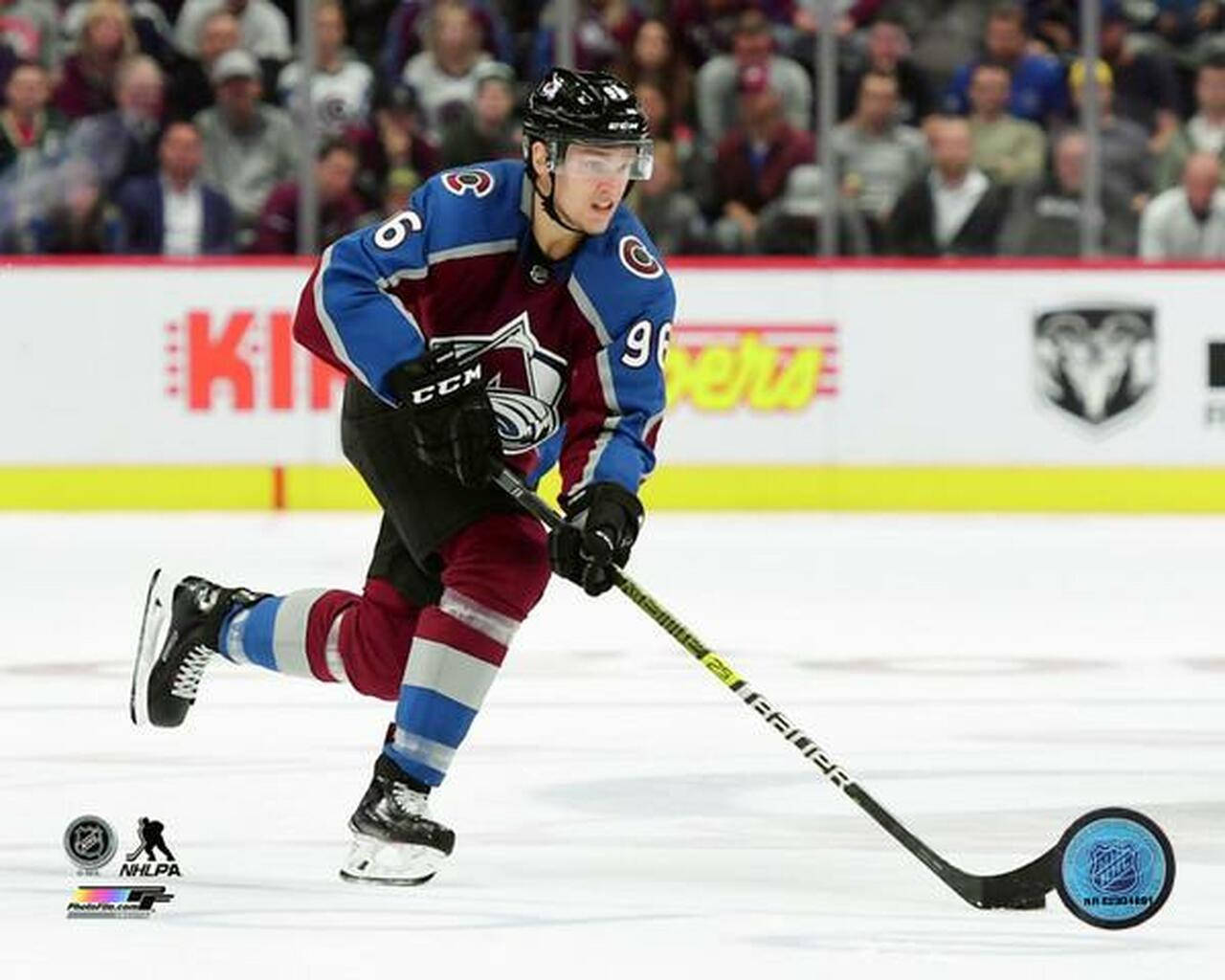 Mikko Rantanen Dribbling Hockey Puck During Game Background