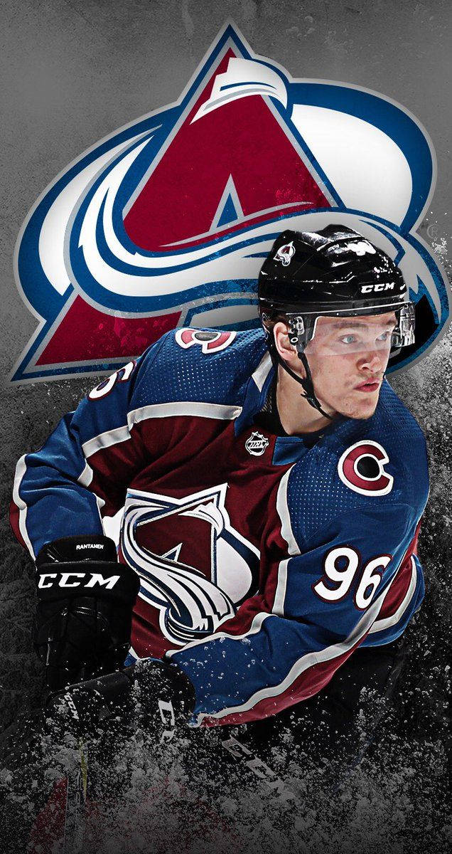 Mikko Rantanen Looking To The Left With Team Logo Background
