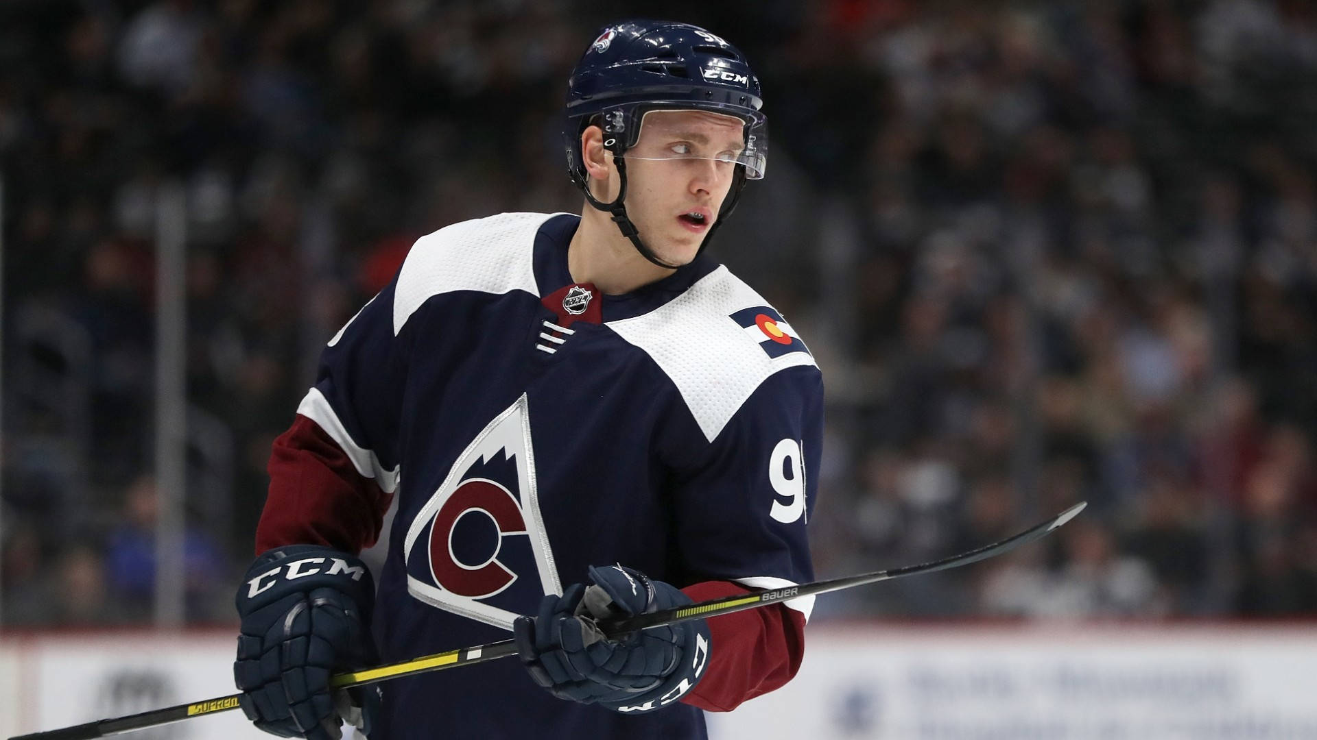 Mikko Rantanen Wearing Jersey With Alternate Logo Looking To The Left Background