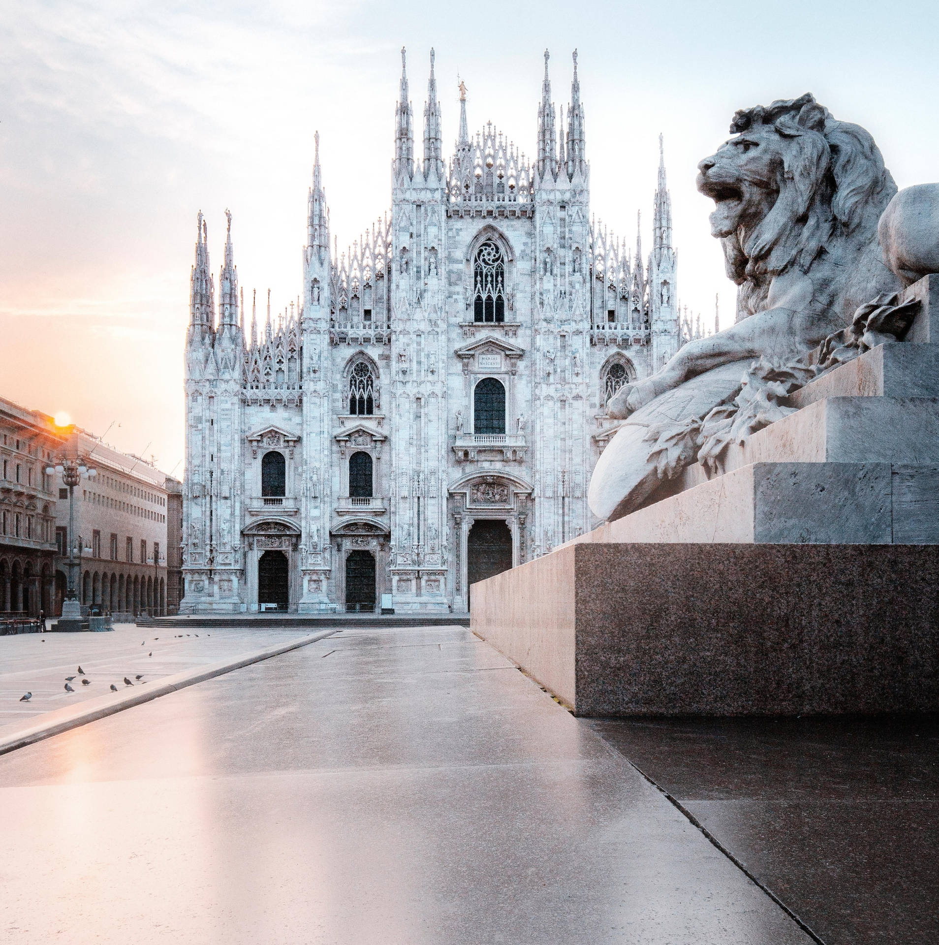 Milan's Cathedral With A Lion Statue Background