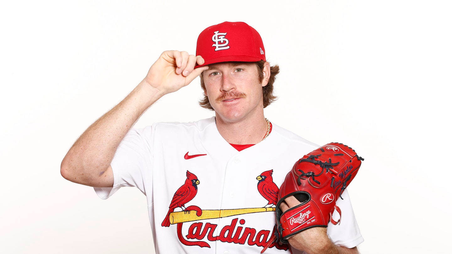 Miles Mikolas Holding Cap Background