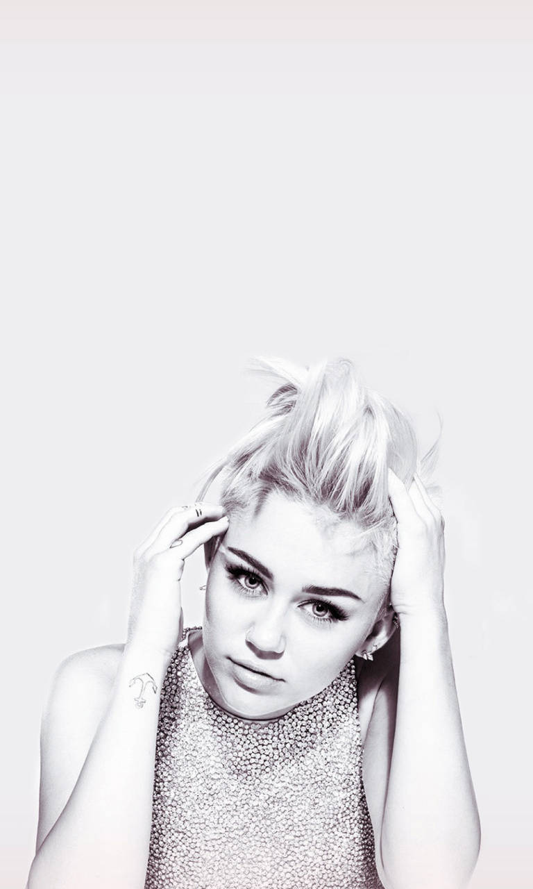 Miley Cyrus In Bold Black And White Background