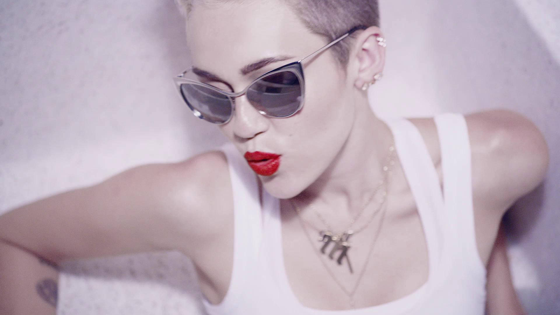 Miley Cyrus's Unstoppable Momentum Background