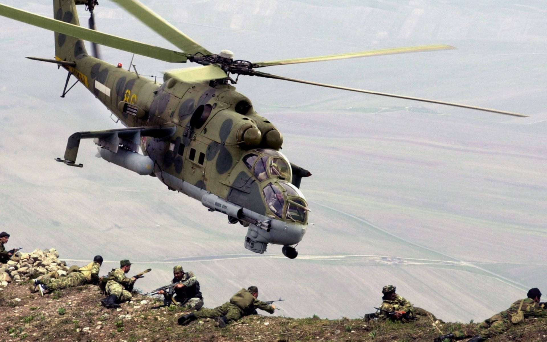 Military Helicopter Over Soldiers Background