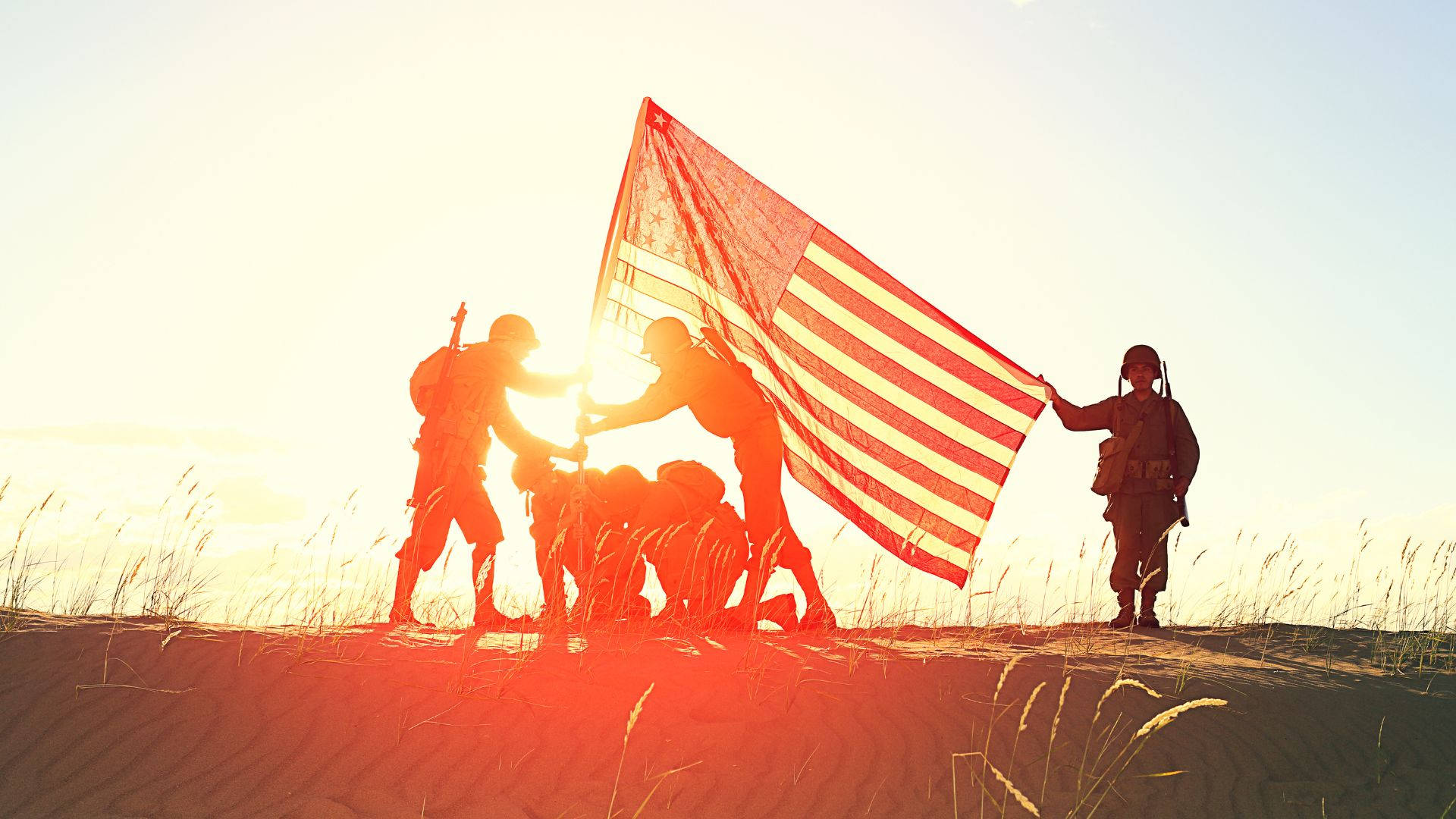 Military Holding American Flag