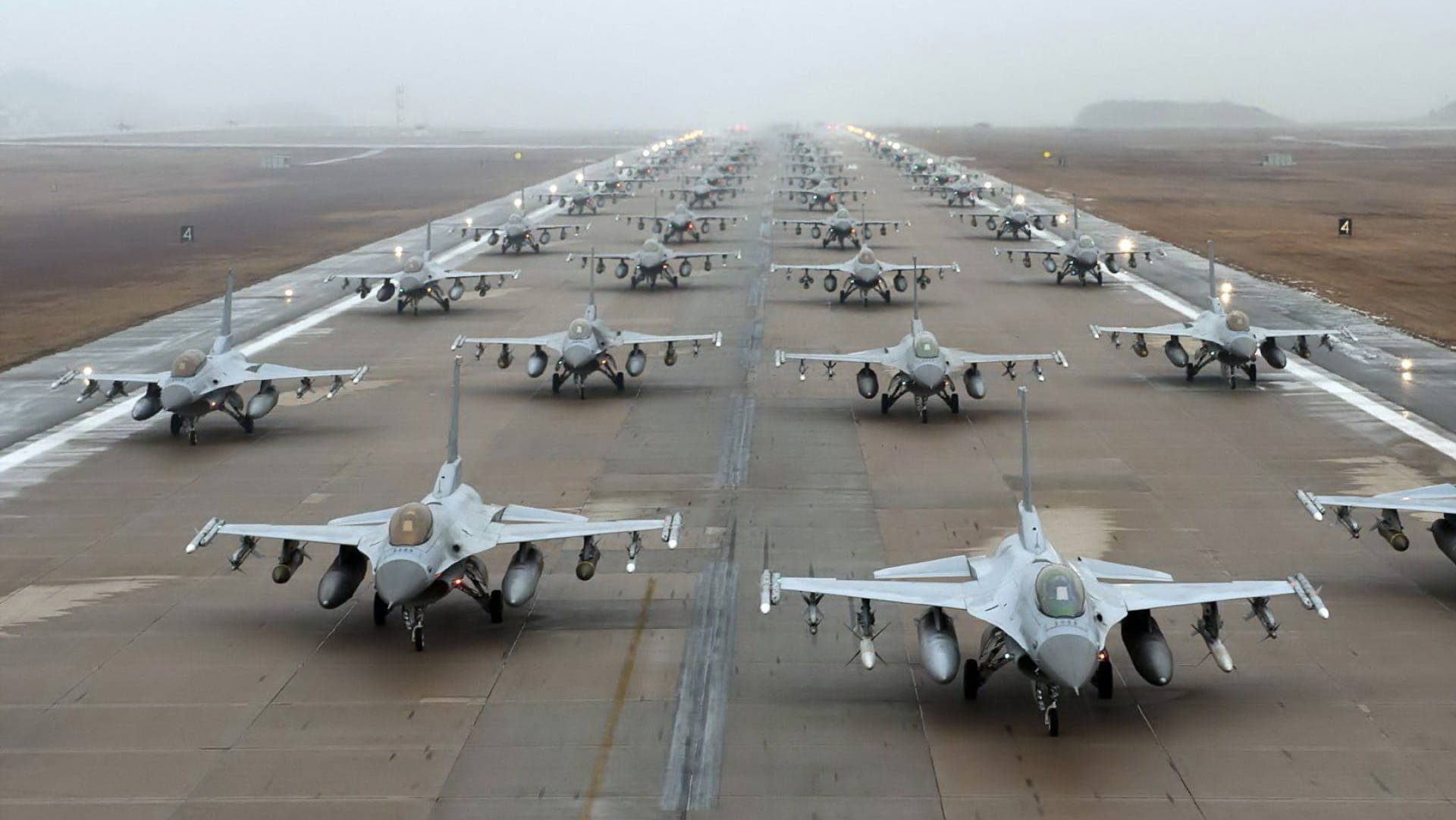 Military Jets Lined Up On Runway