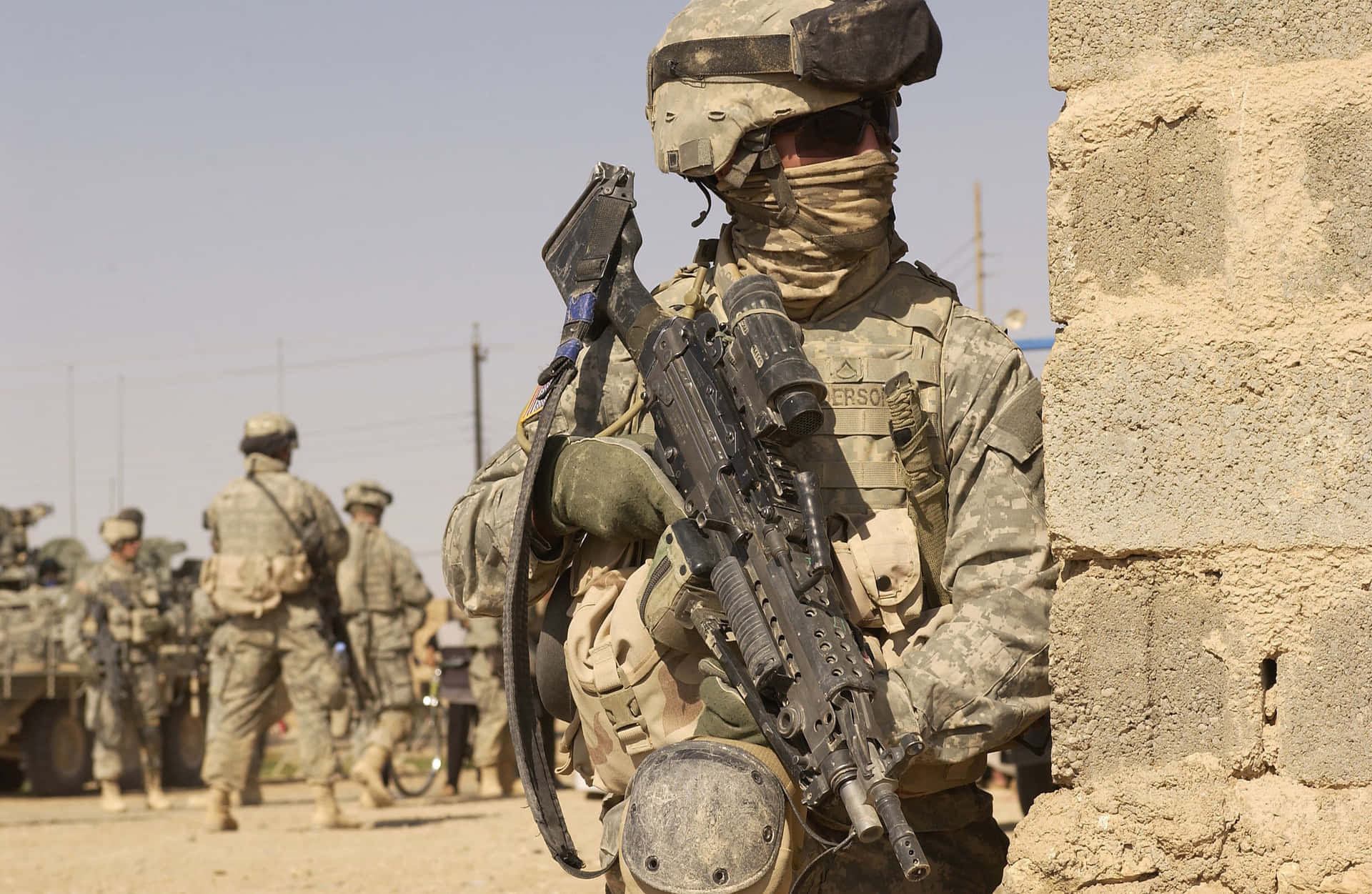 Military Uniform Holding Gun Background