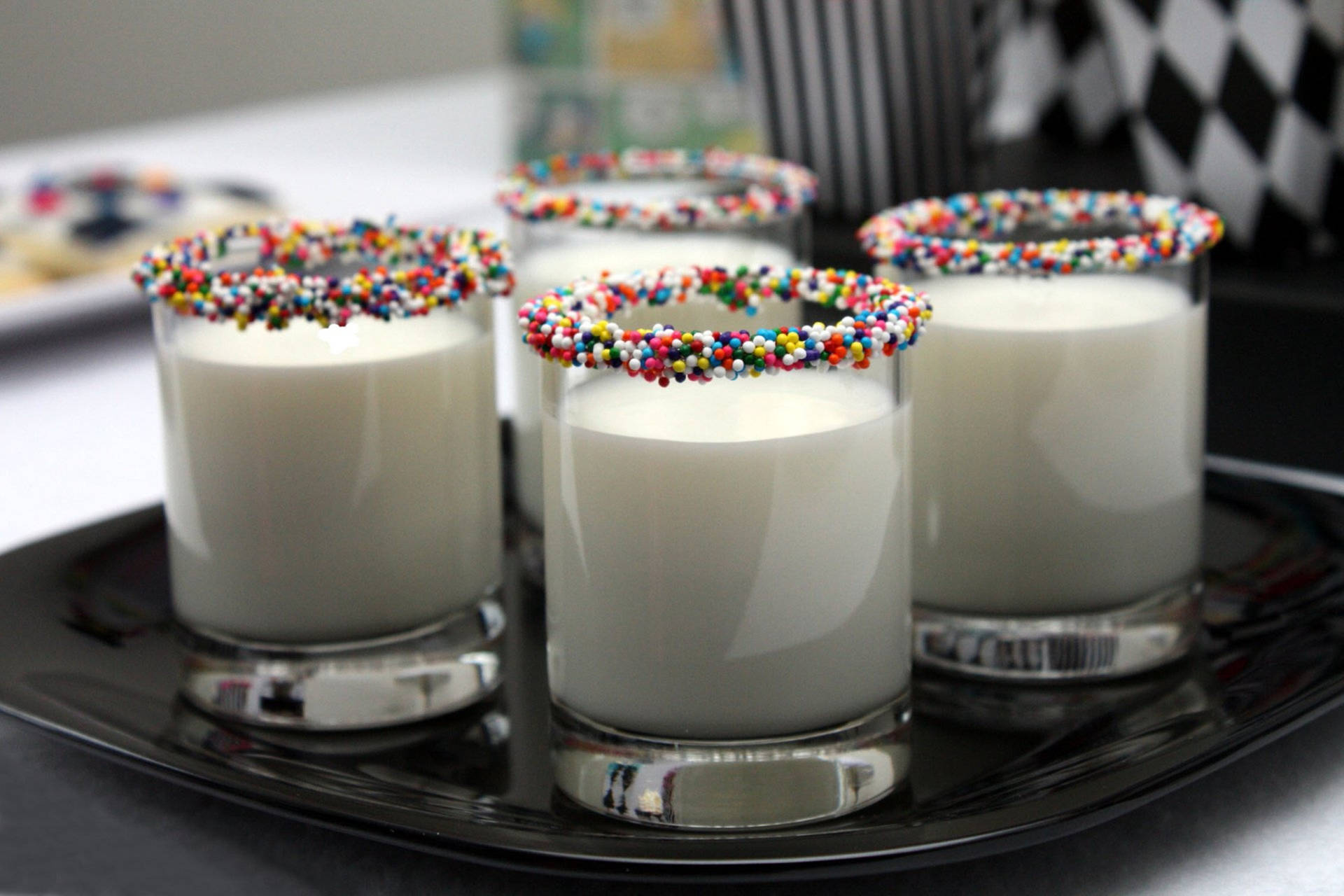 Milk On Glass With Sprinkles Design Background