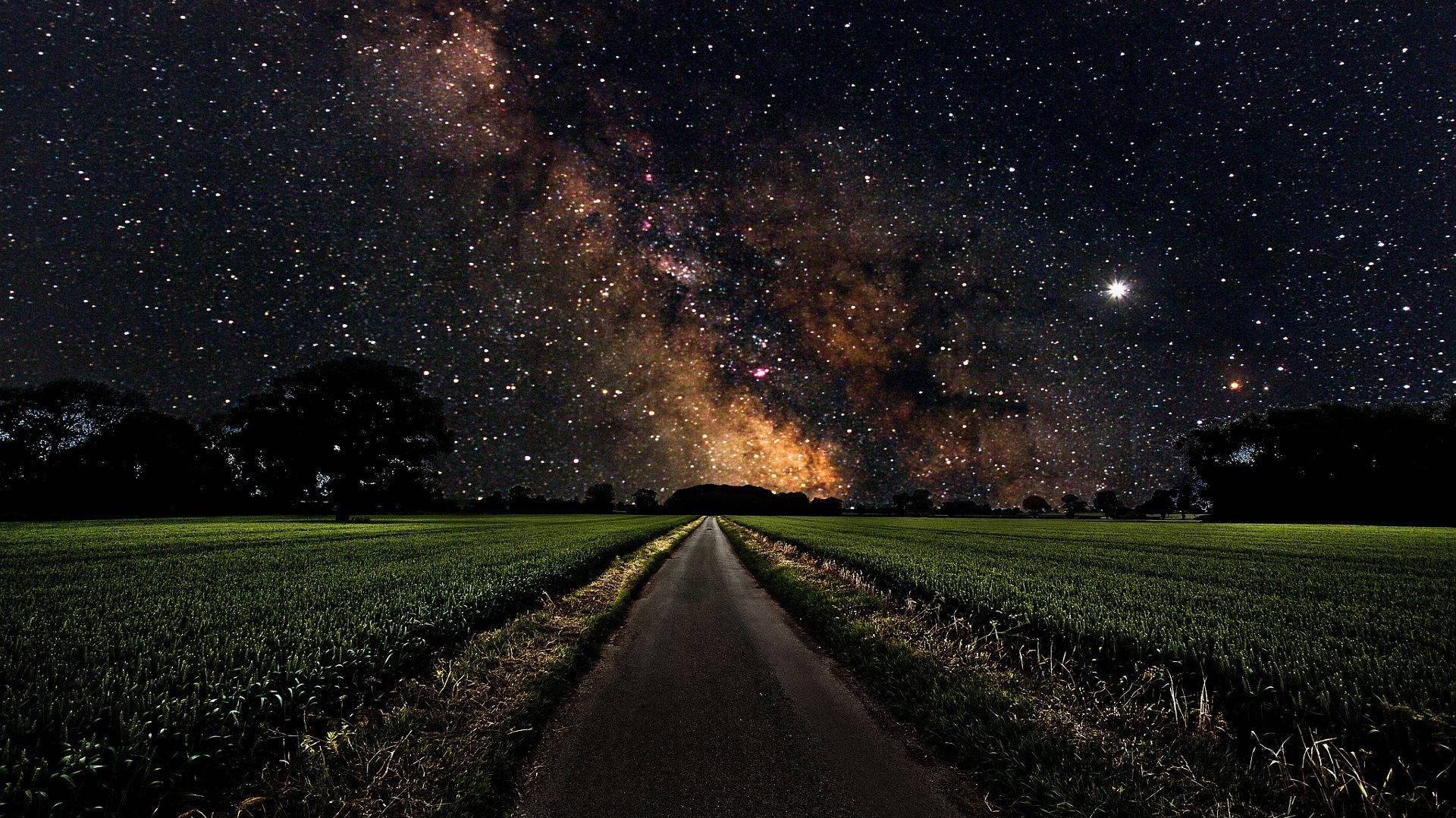 Milky Way In A Long Road Background