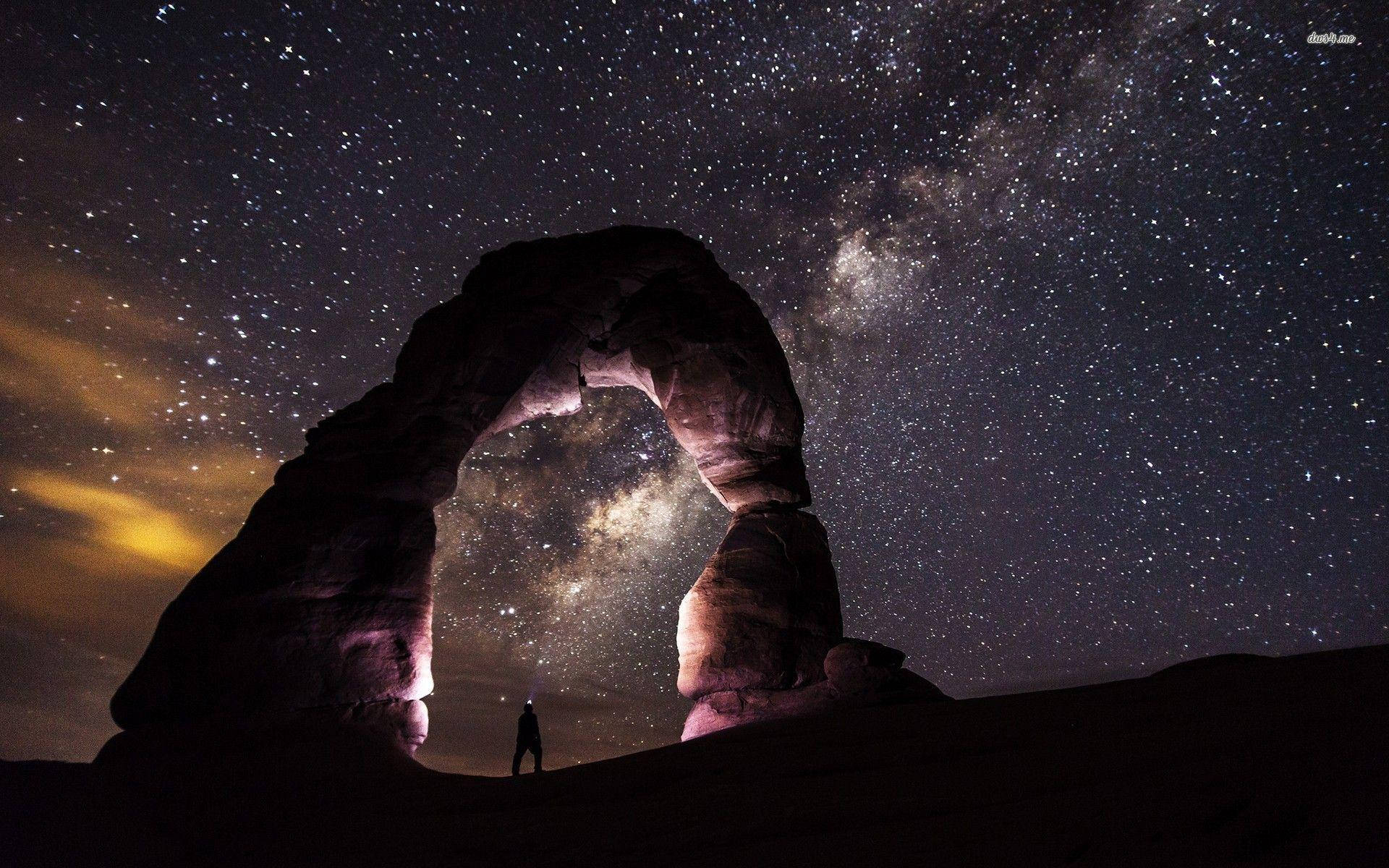 Milky Way Over A Rock Formation Background
