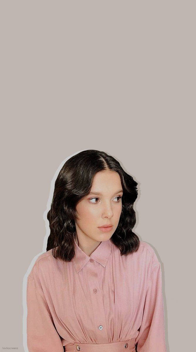 Millie Bobby Brown Shows An Everlasting Smile Background