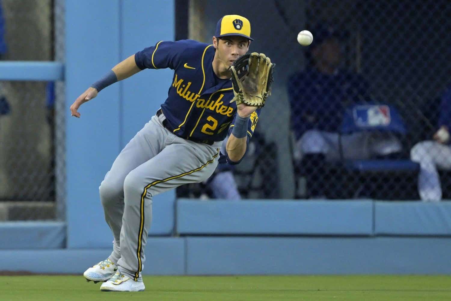 Milwaukee Baseball Player Catching Ball Background