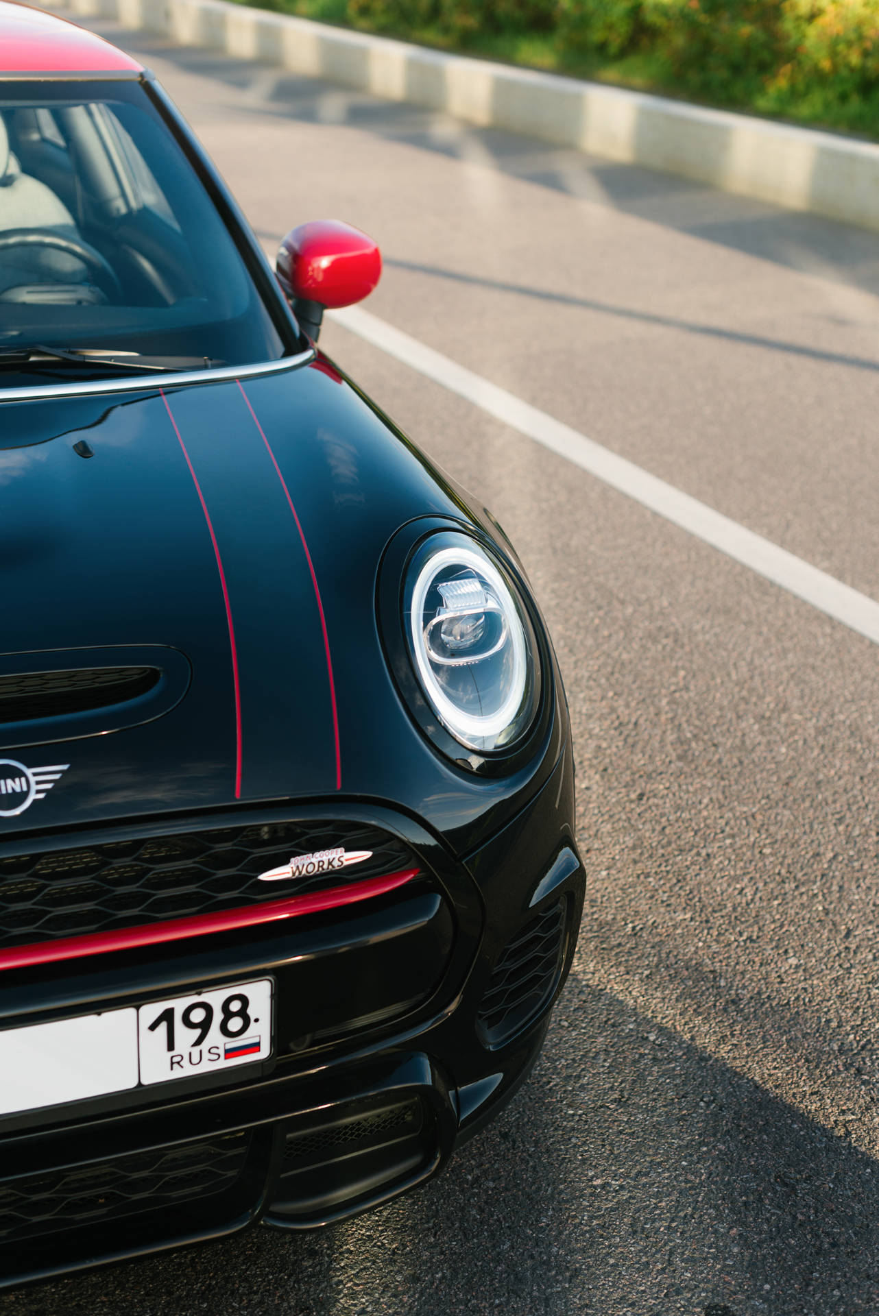 Mini Cooper Logo Of A Black And Red Mini Cooper Vehicle