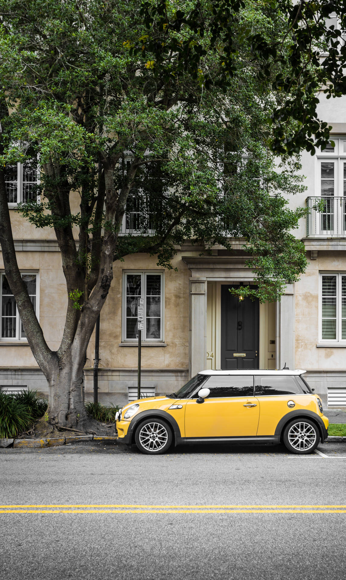 Mini Cooper Parking At The Street Background