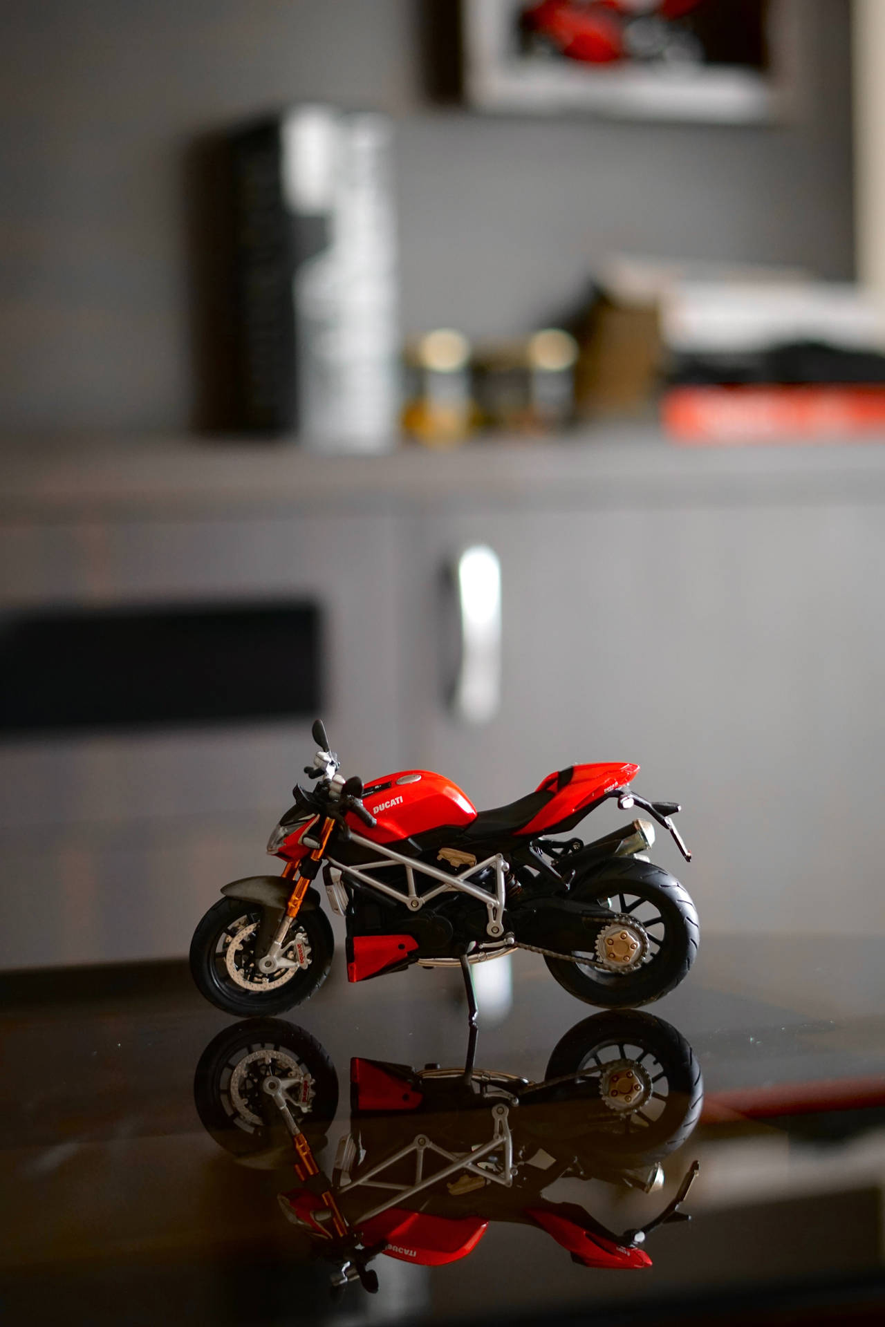 Miniature Ducati Red Bike Toy Model Background