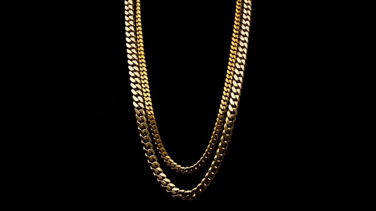 Minimalist And Stylish: A 14kt Gold Chain Background