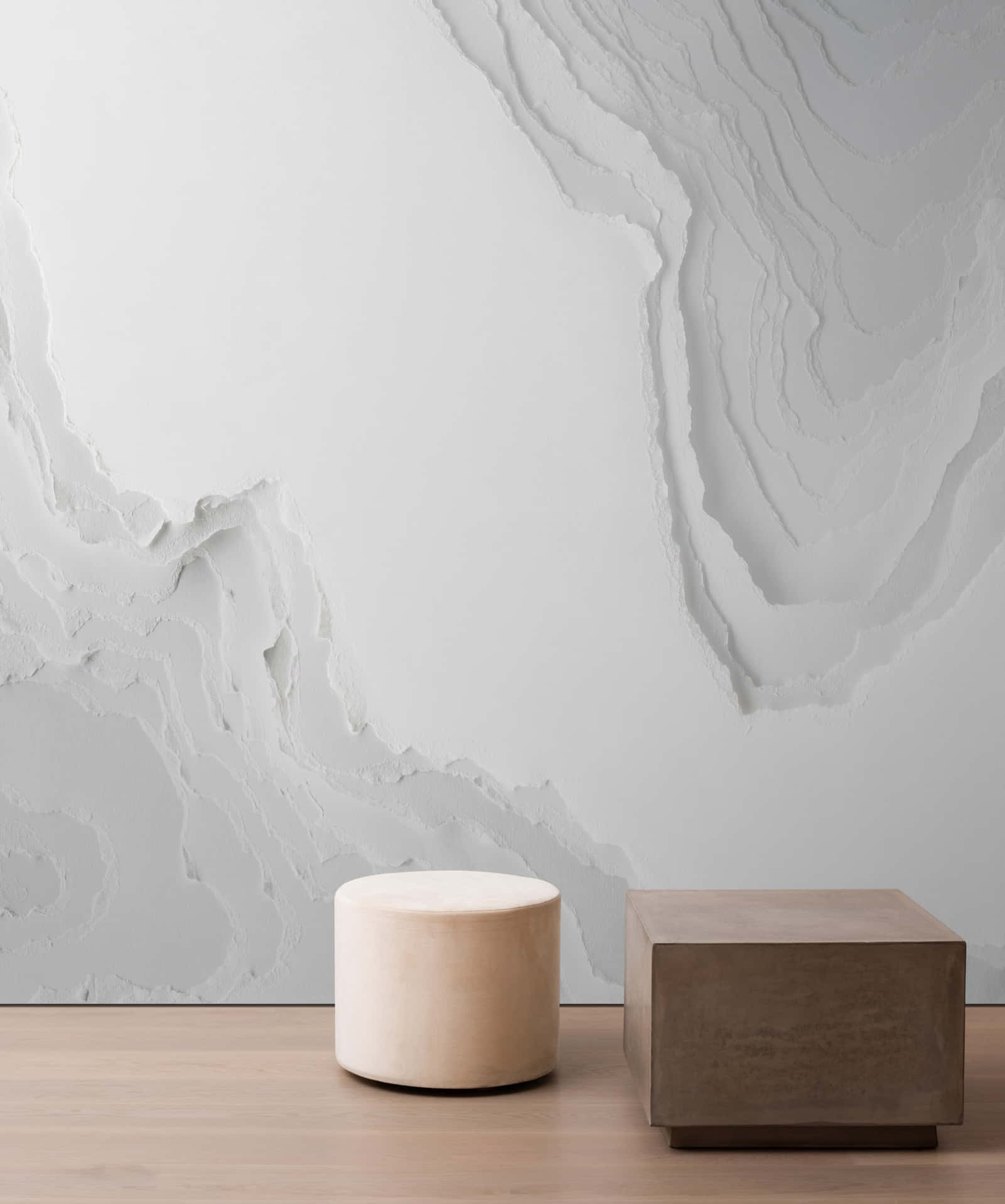 Minimalist Interiorwith Marble Walland Geometric Stools Background