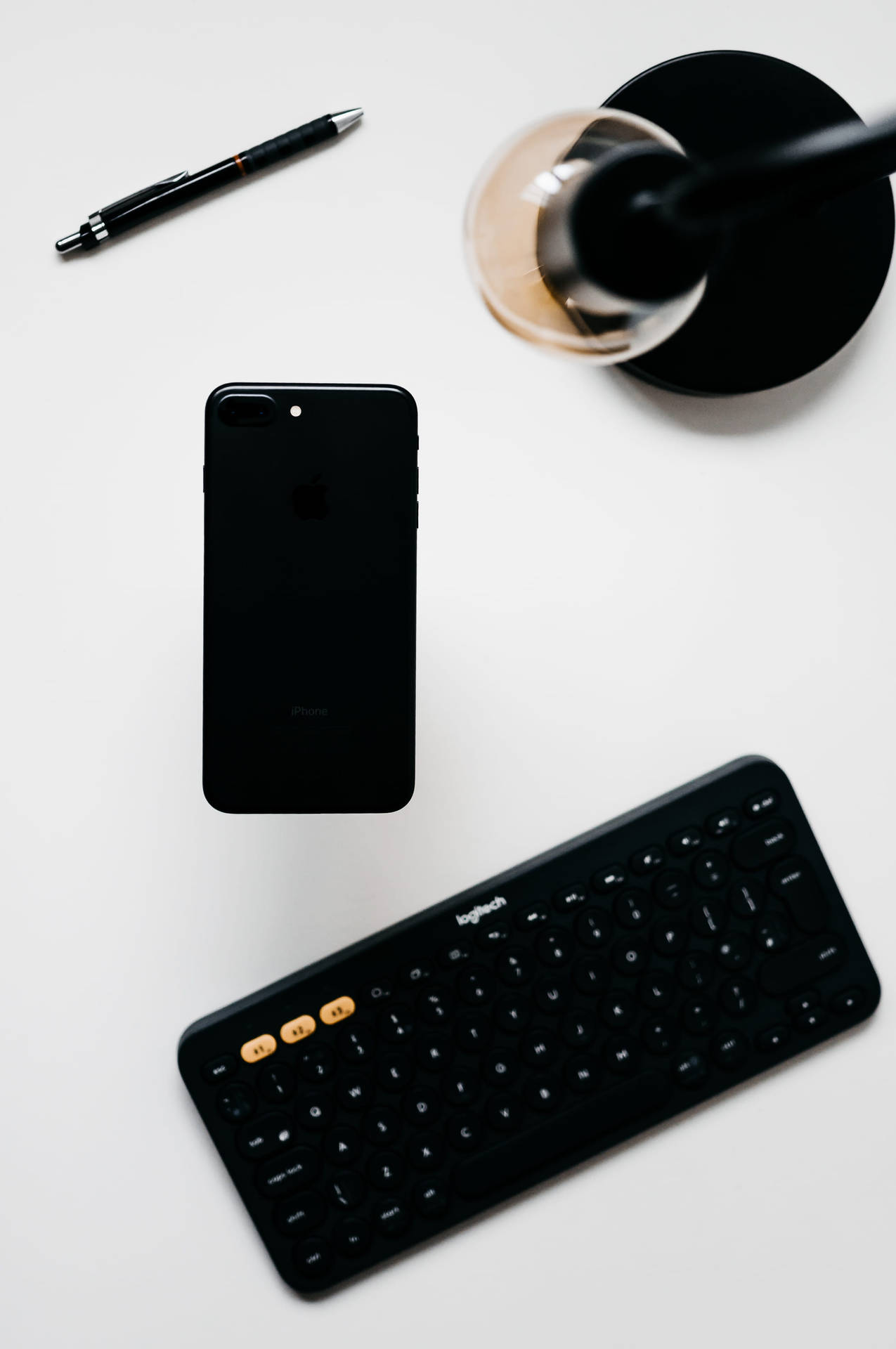 Minimalist Iphone Desk With Black Keyboard