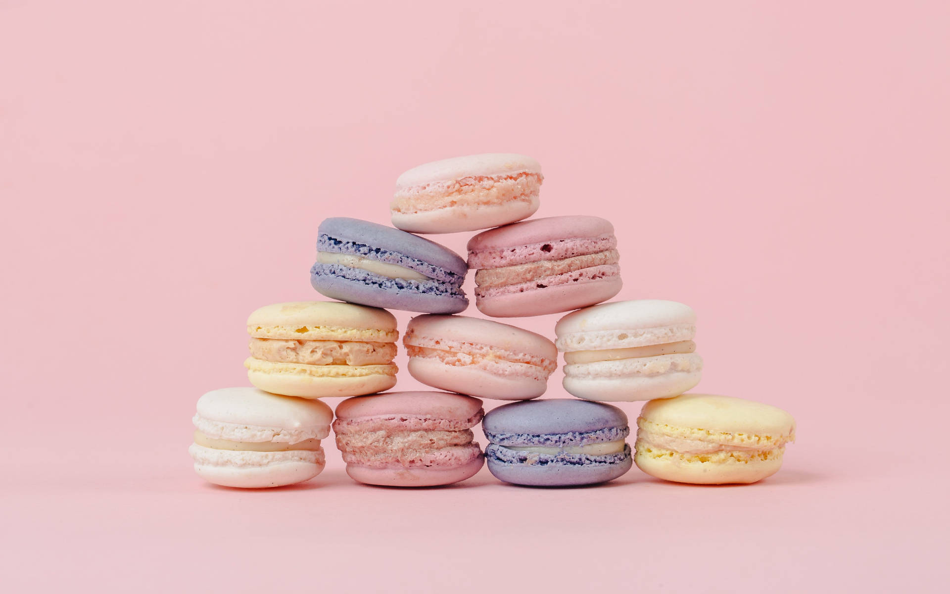 Minimalist Macaroons In Pastel Colors Background