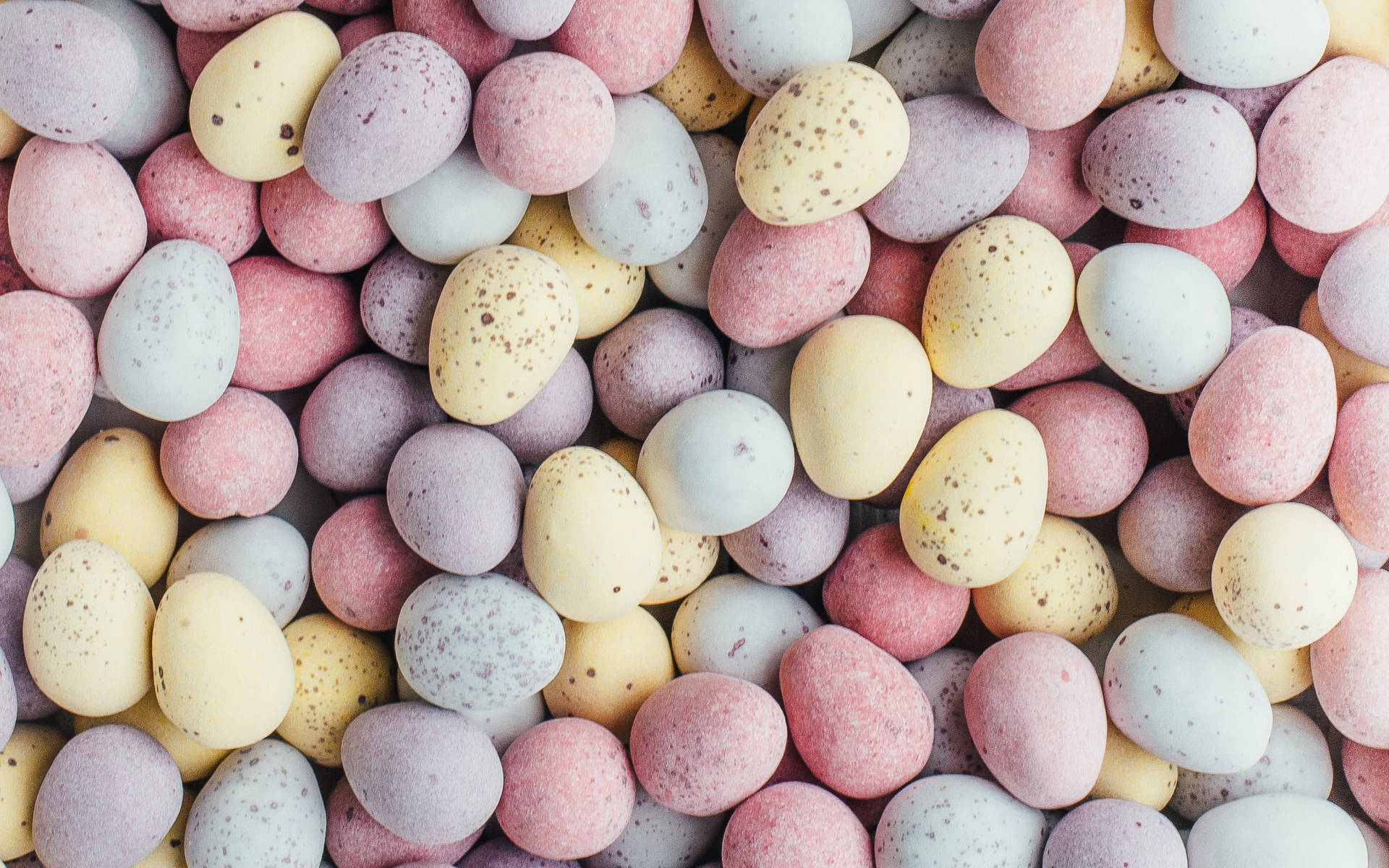 Minimalist Pebbles In Various Pastel Colors Background