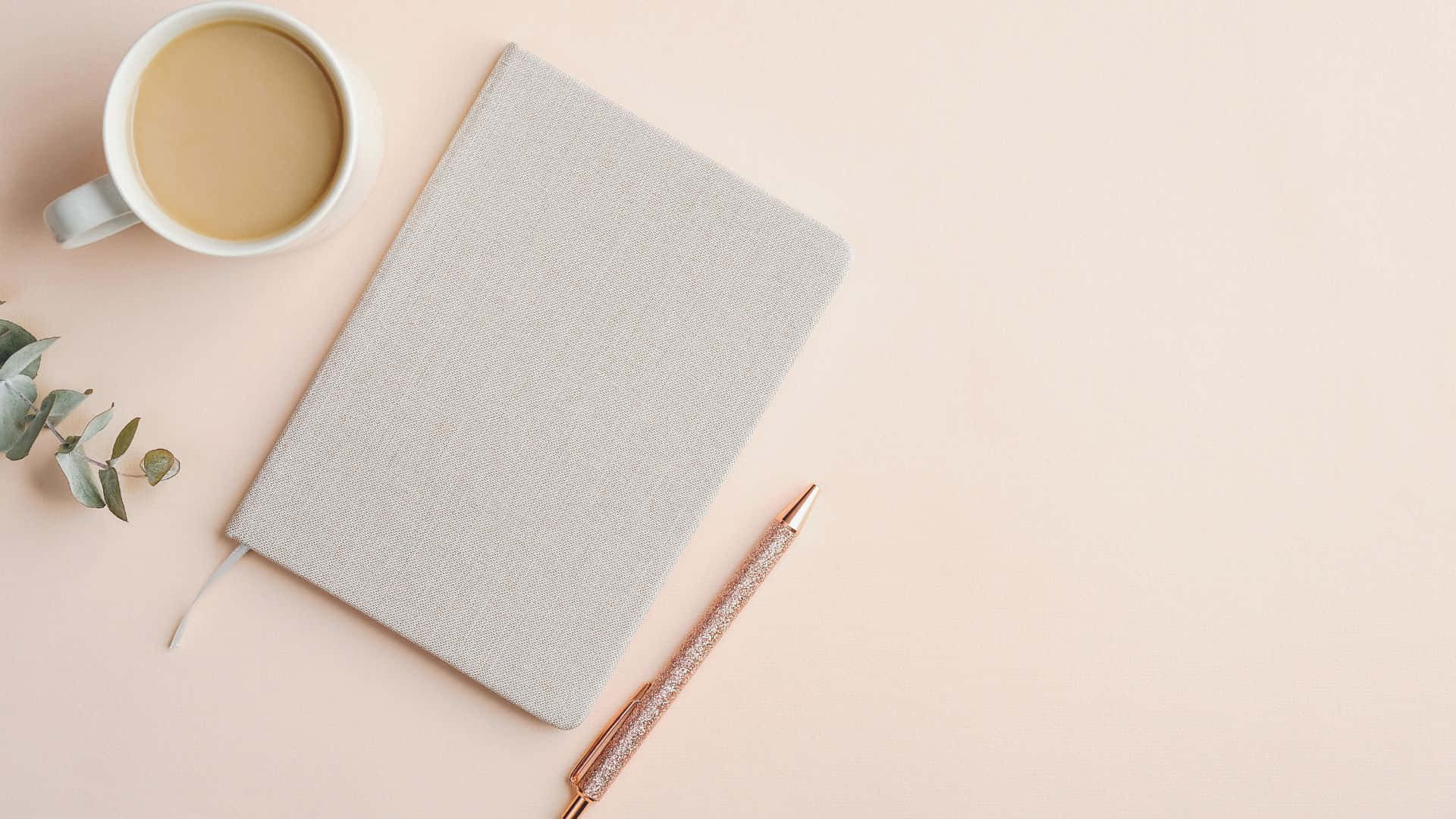 Minimalist Workspacewith Notebookand Coffee Background