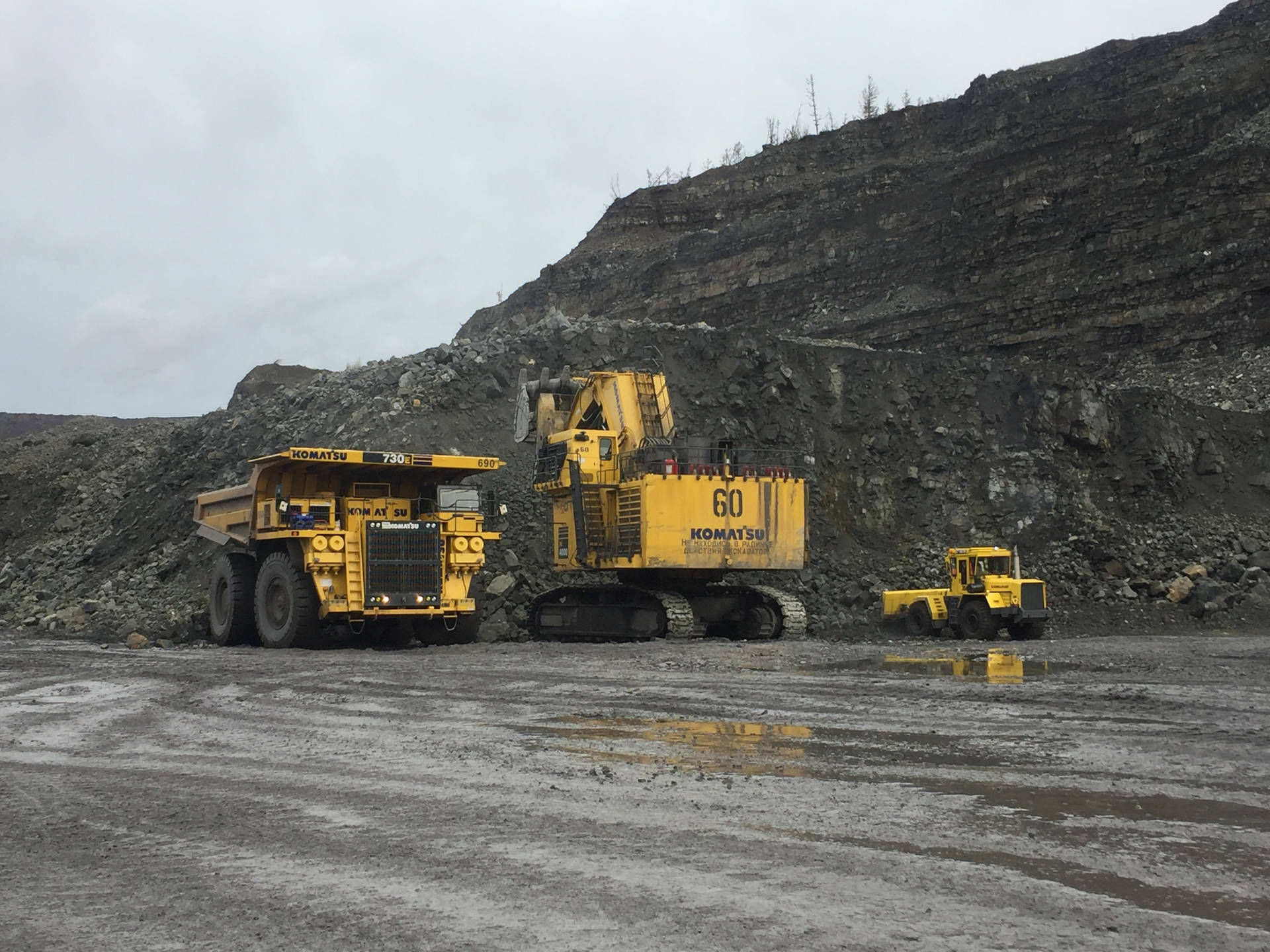 Mining Trucks Muddy Soil Background