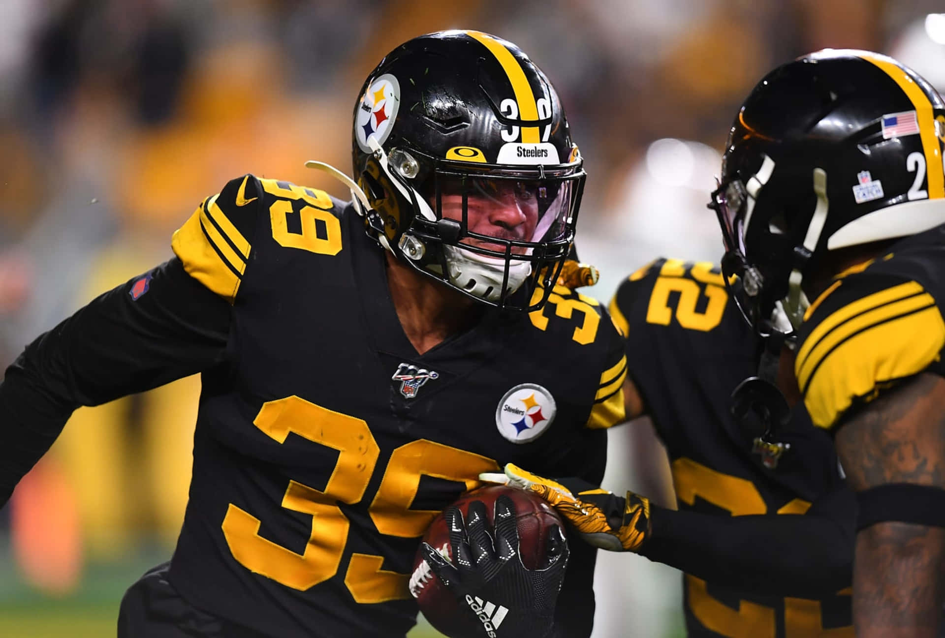 Minkah Fitzpatrick Pittsburgh Steelers Carrying Football Background