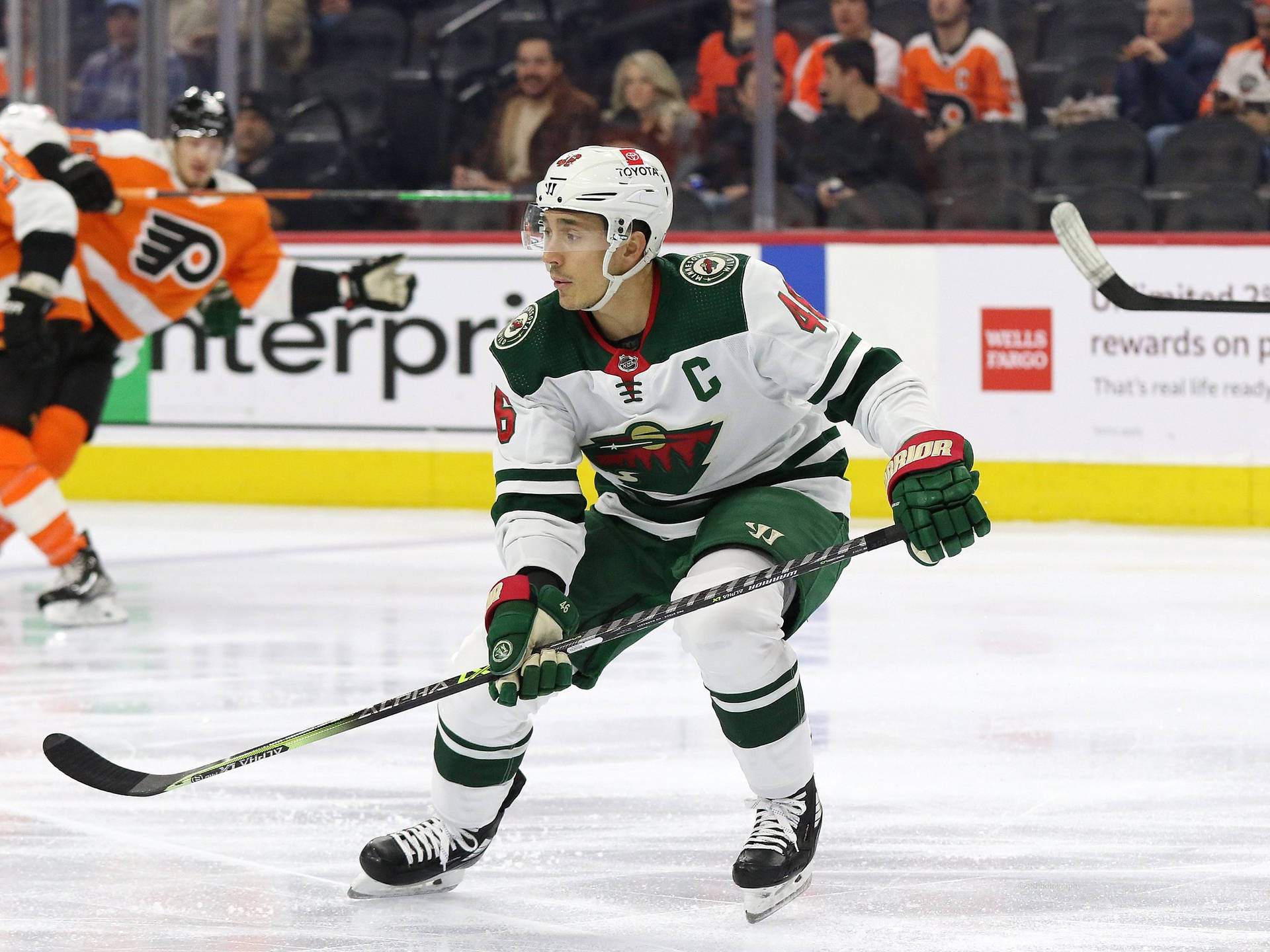 Minnesota Wild Defenseman Jared Spurgeon Against Philadelphia Flyers Background