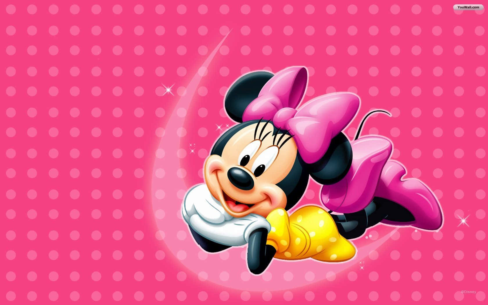 Minnie Mouse Spreads Magic In Pink Background